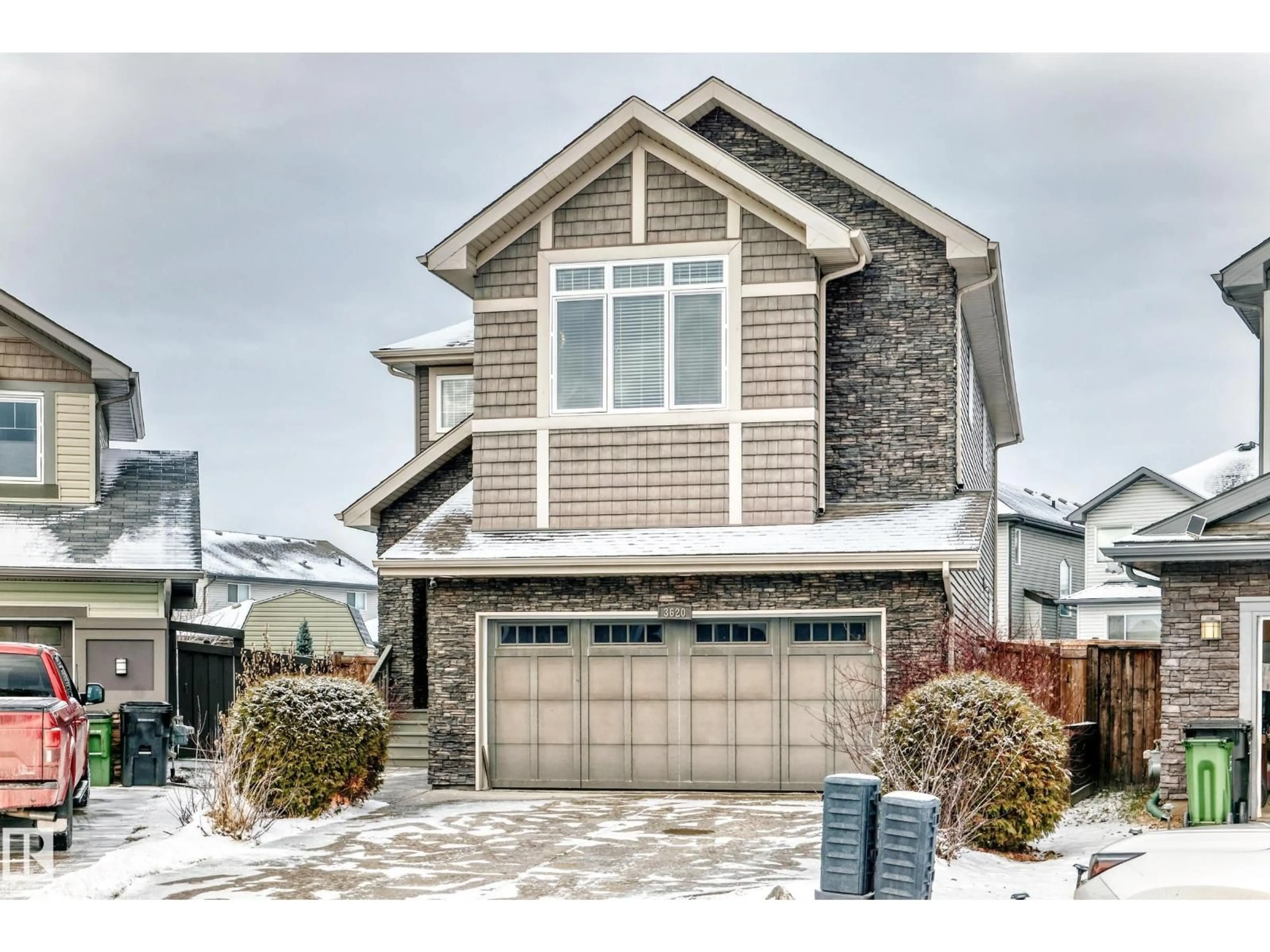 Home with vinyl exterior material, street for NW - 3620 167B AV, Edmonton Alberta T5Y0X7