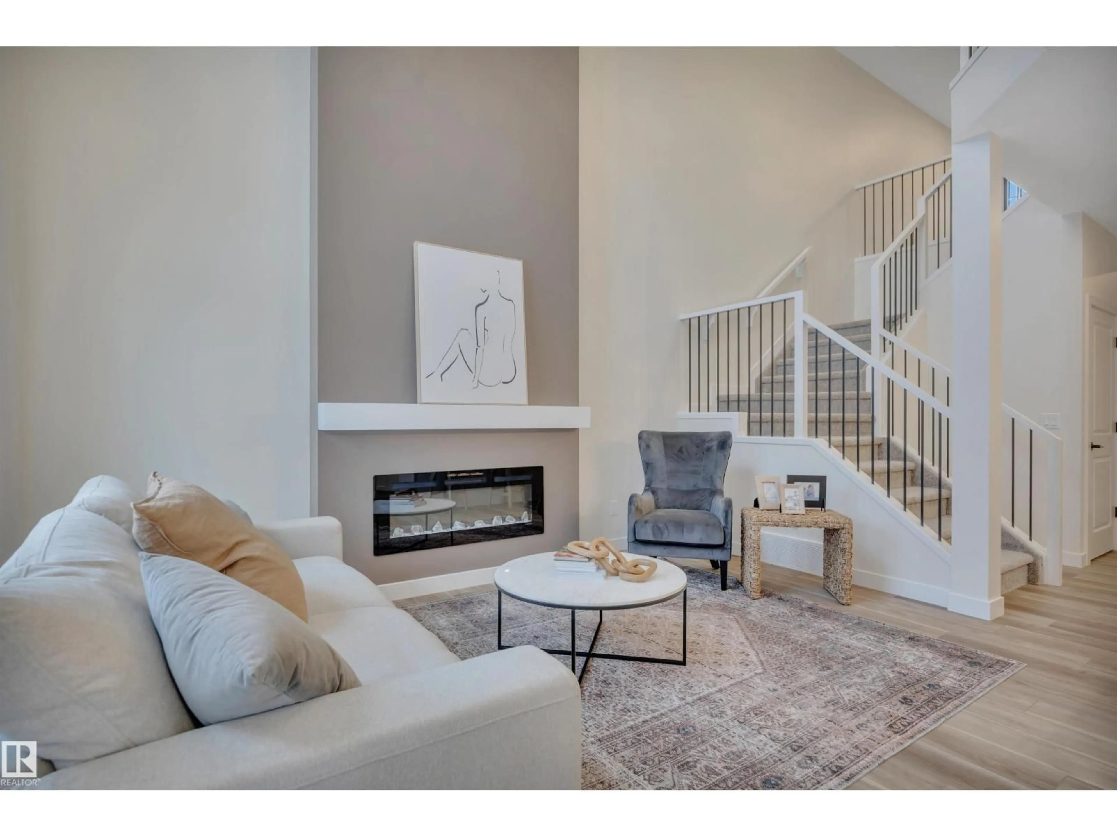 Living room with furniture, unknown for 304 JUNIPER CV, Leduc Alberta T9E1S7