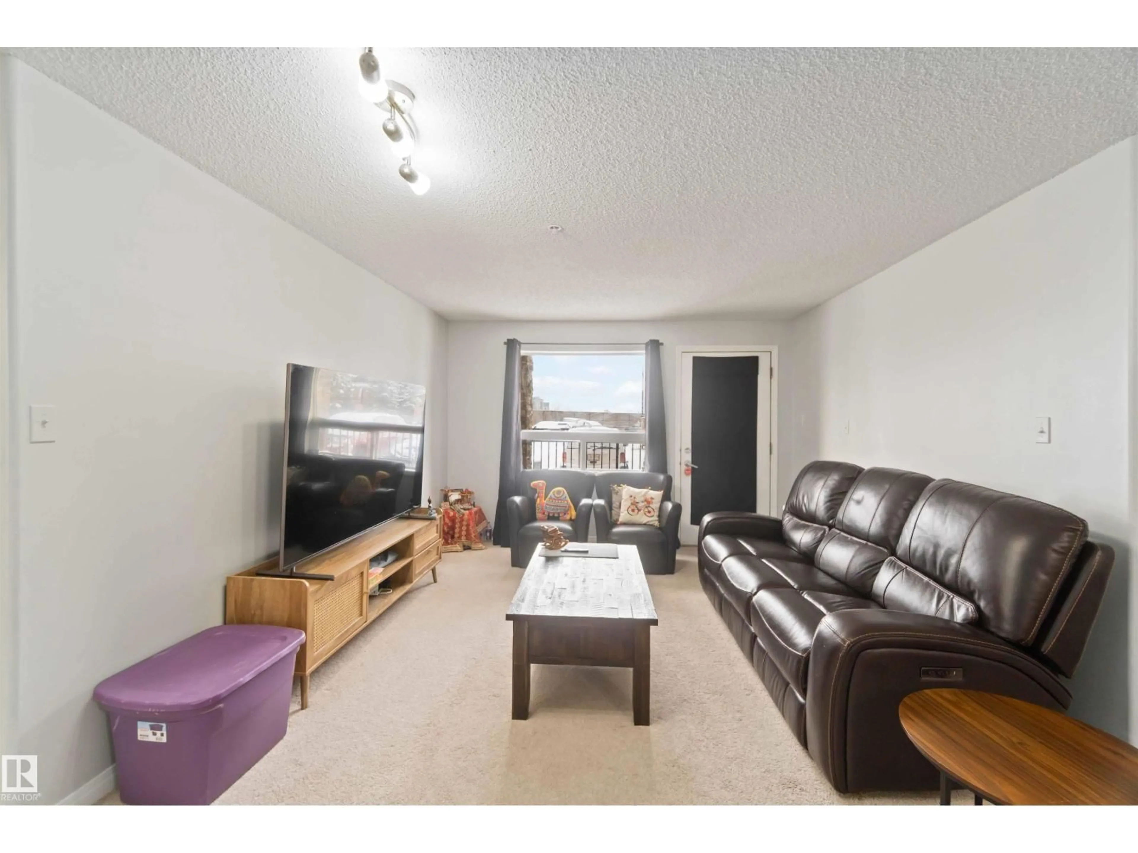 Living room with furniture, unknown for 9357 - 2117 SIMPSON DR, Edmonton Alberta T6R0N3