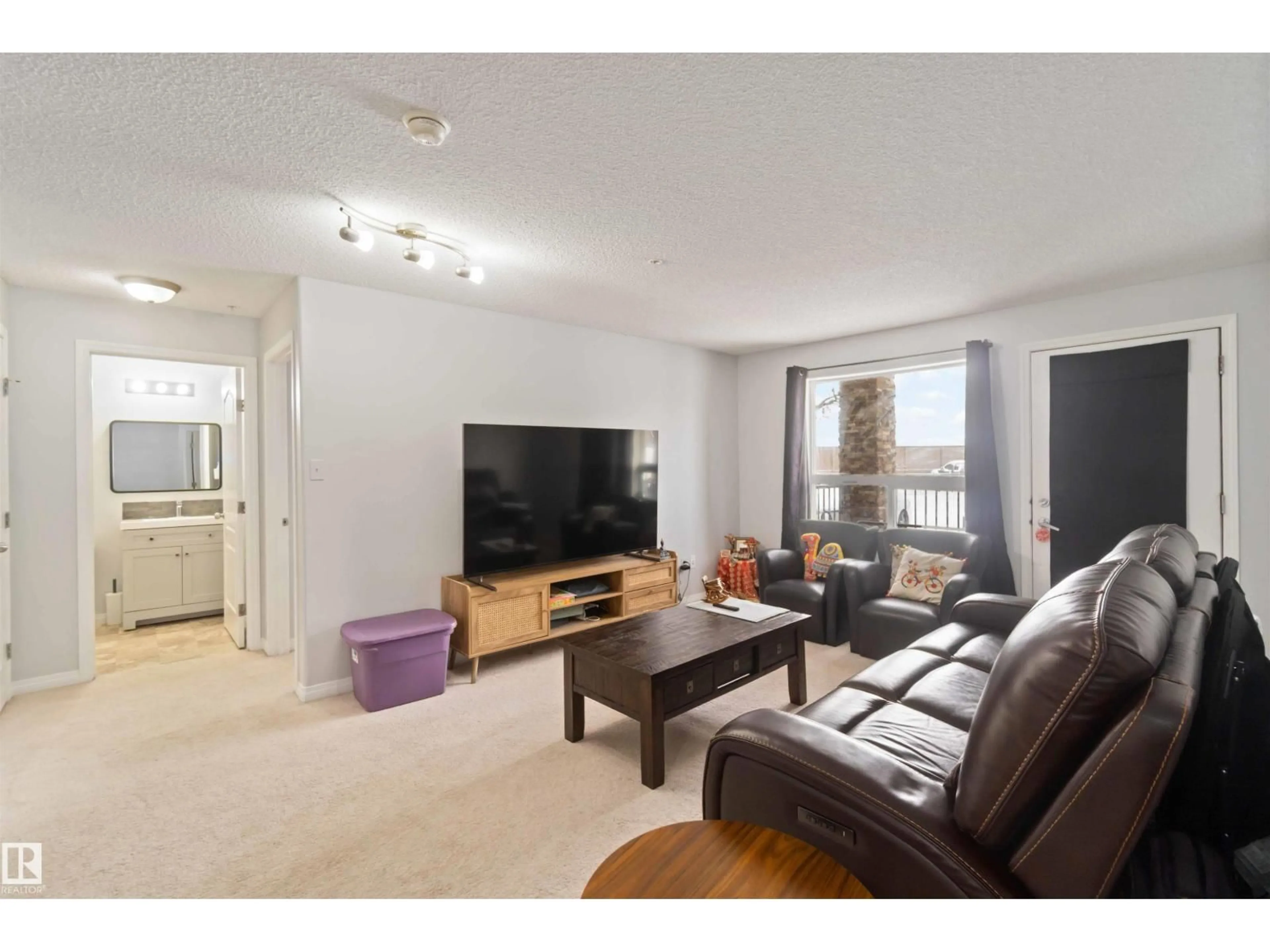 Living room with furniture, unknown for 9357 - 2117 SIMPSON DR, Edmonton Alberta T6R0N3