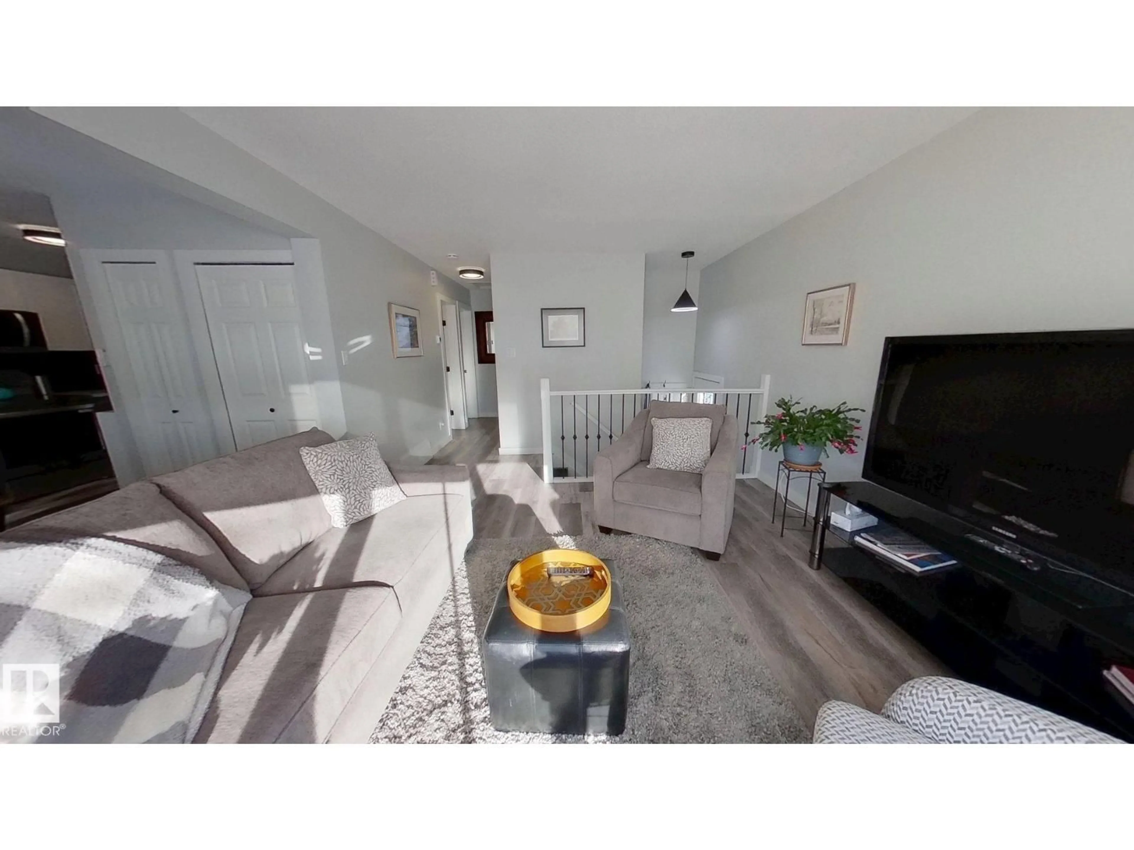 Living room with furniture, unknown for 7102A MARLER DR, Camrose Alberta T4V3L8