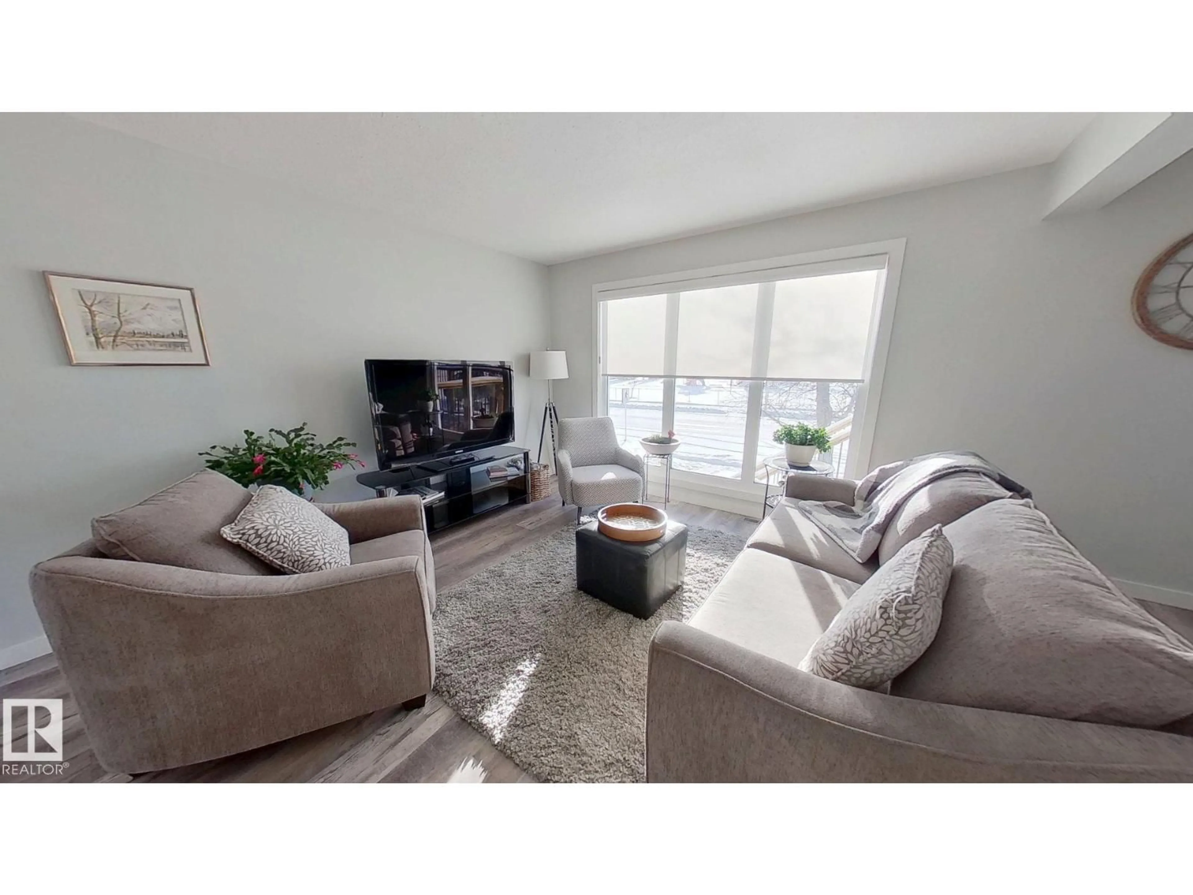 Living room with furniture, unknown for 7102A MARLER DR, Camrose Alberta T4V3L8