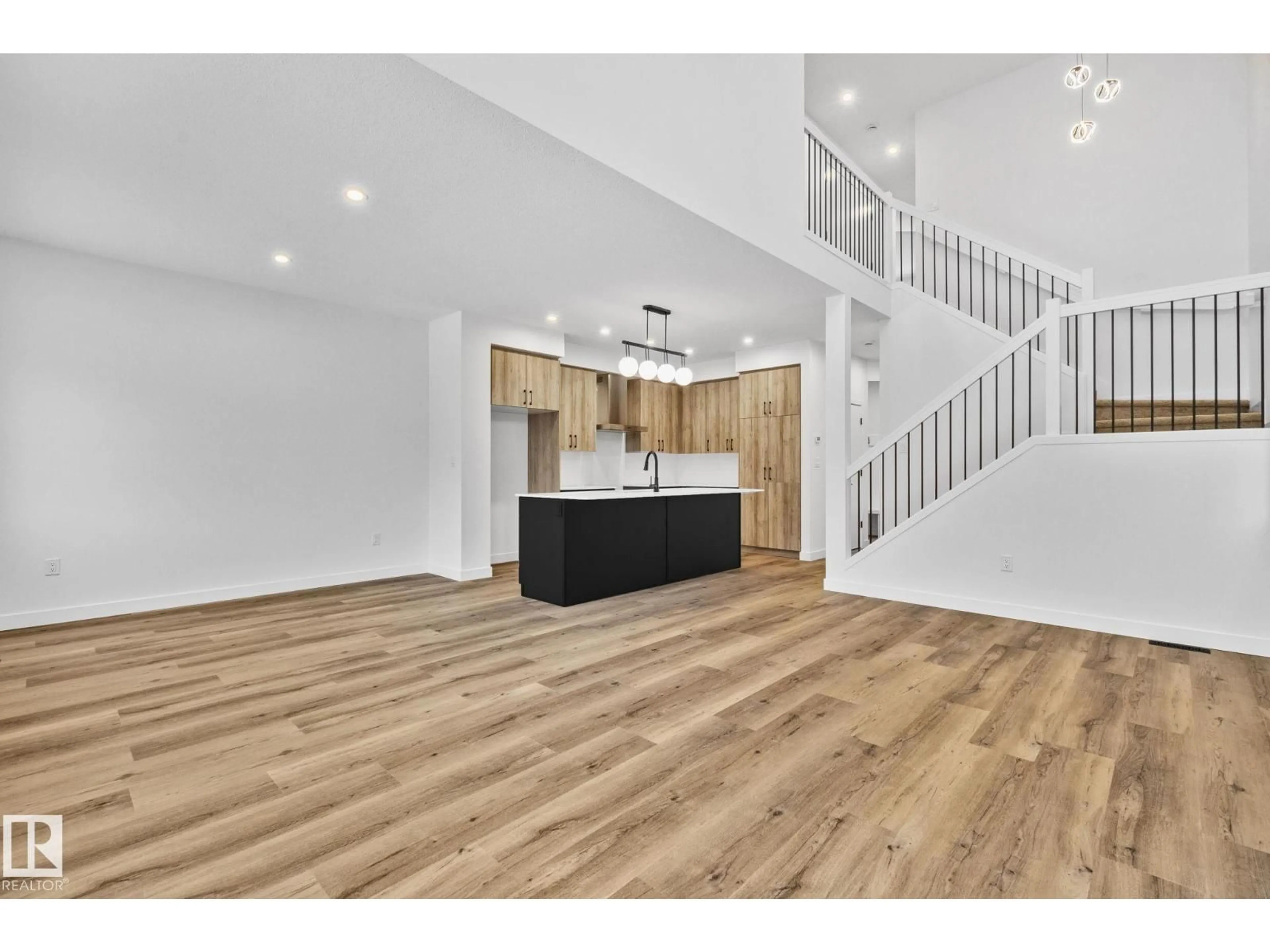 Open concept kitchen, wood/laminate floor for 114 ROYAL STREET, St. Albert Alberta T8N7X4