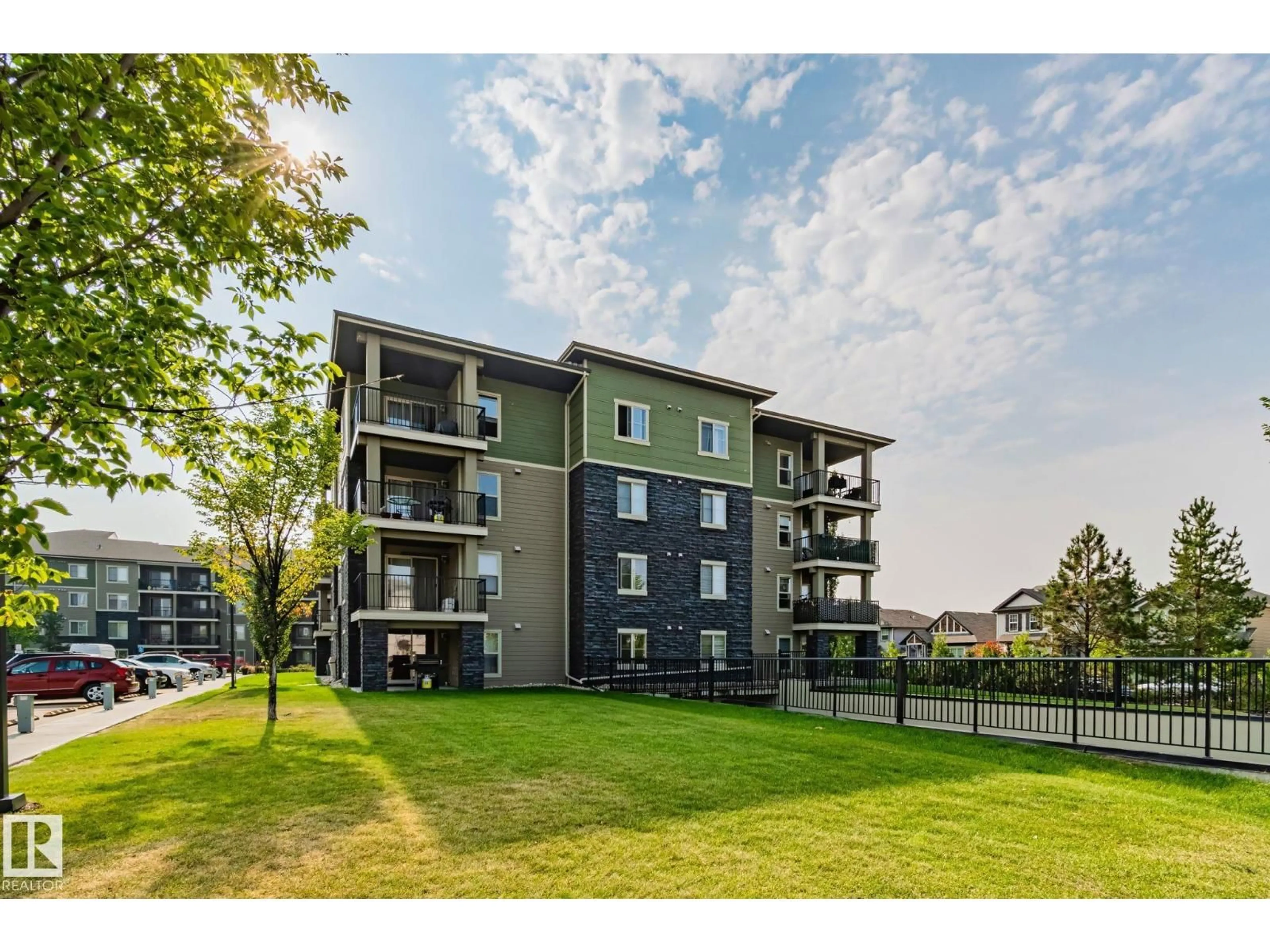 A pic from outside/outdoor area/front of a property/back of a property/a pic from drone, water/lake/river/ocean view for 270 - 317 MCCONACHIE DRIVE NW, Edmonton Alberta T5Y3N4