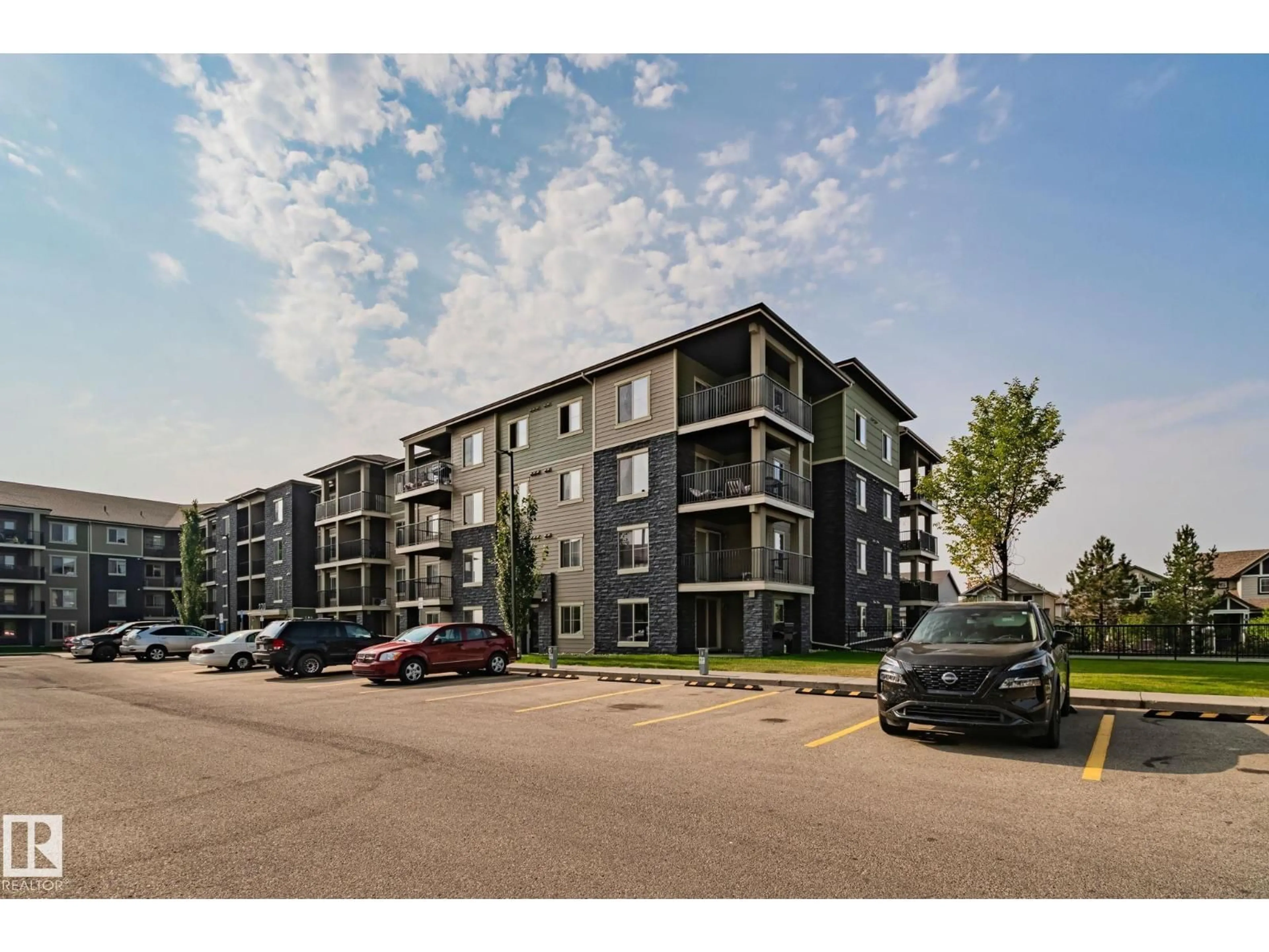 A pic from outside/outdoor area/front of a property/back of a property/a pic from drone, street for 270 - 317 MCCONACHIE DRIVE NW, Edmonton Alberta T5Y3N4