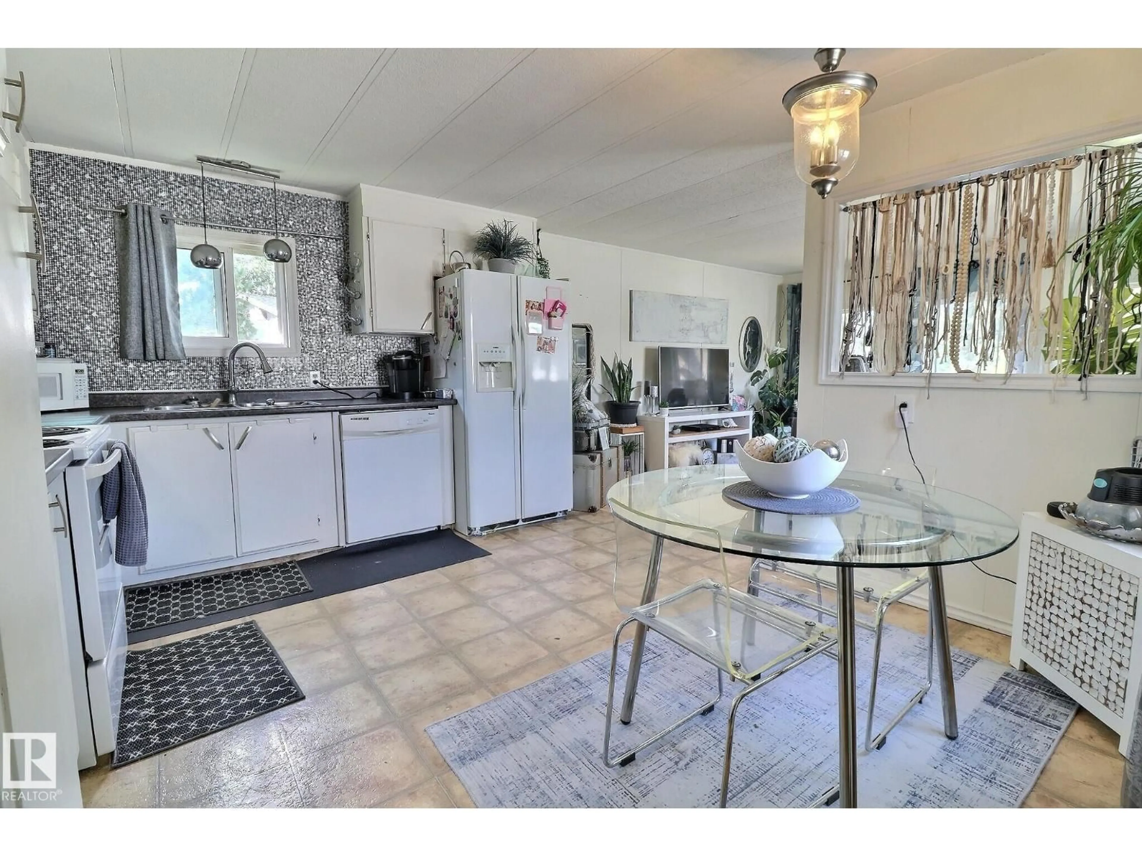 Open concept kitchen, ceramic/tile floor for 289 JUNIPER CR, Edmonton Alberta T5Y6L6