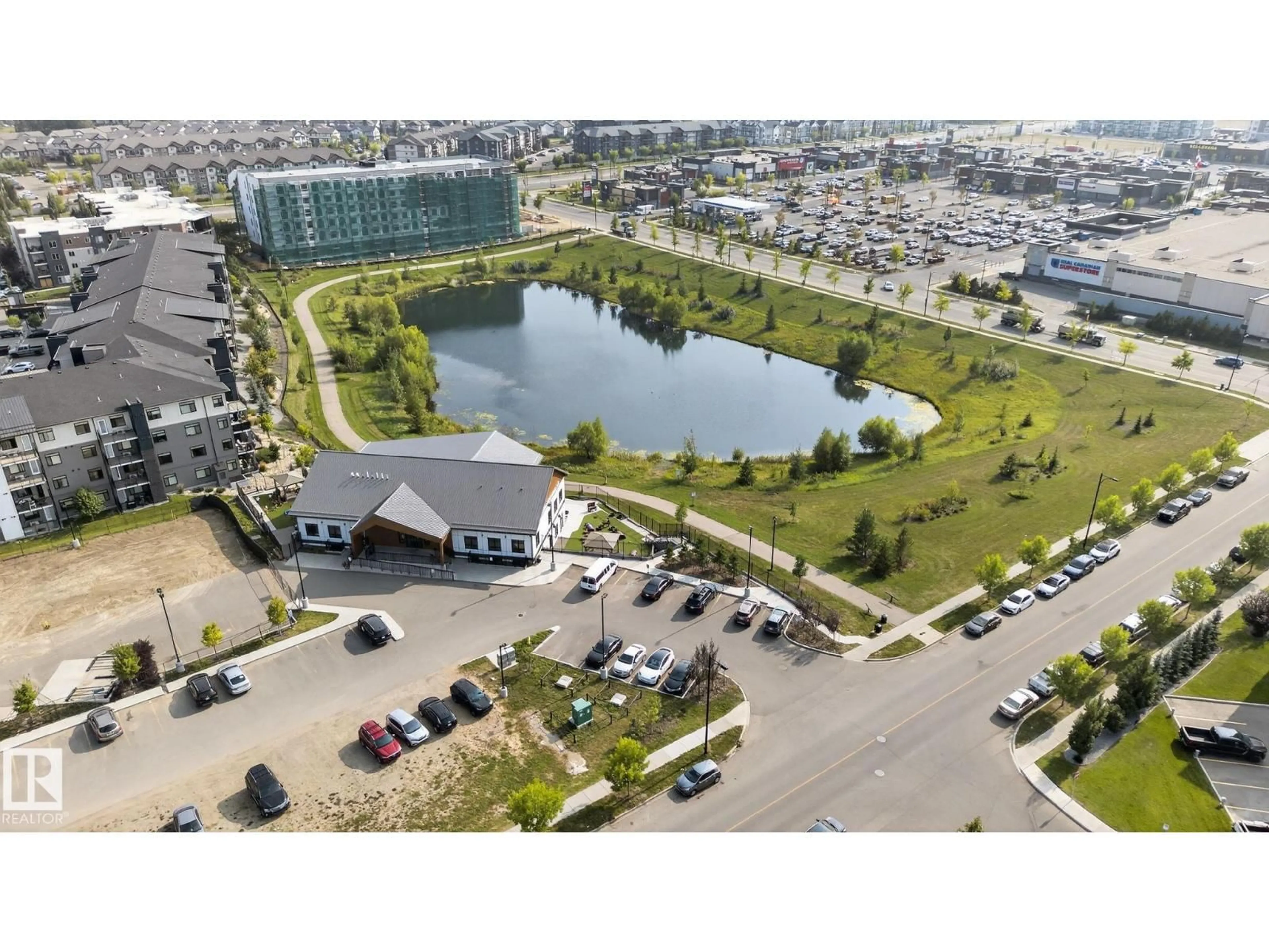 A pic from outside/outdoor area/front of a property/back of a property/a pic from drone, water/lake/river/ocean view for #414 - 12035 22 AV, Edmonton Alberta T6W2X9