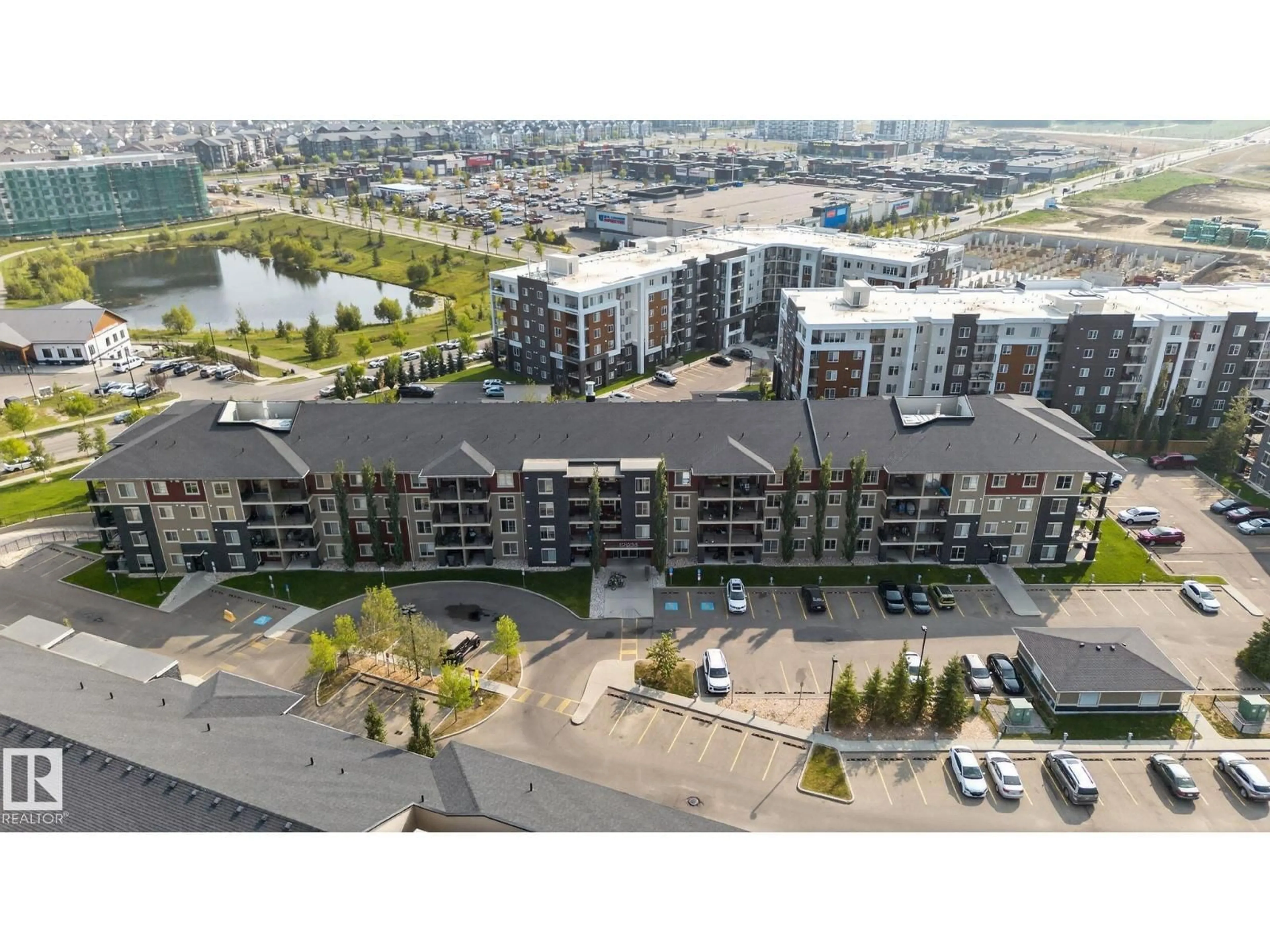 A pic from outside/outdoor area/front of a property/back of a property/a pic from drone, city buildings view from balcony for #414 - 12035 22 AV, Edmonton Alberta T6W2X9