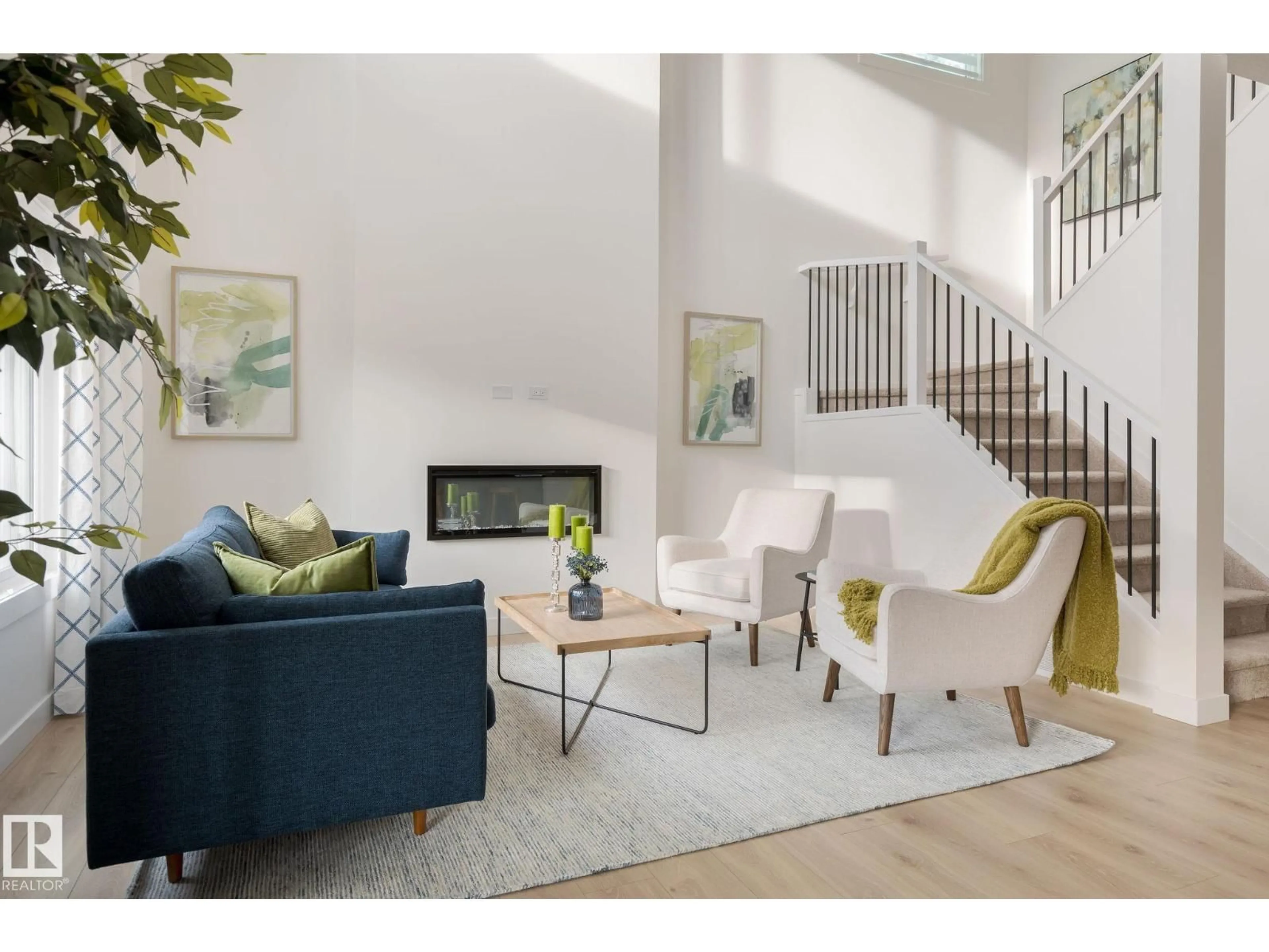 Living room with furniture, wood/laminate floor for 17828 70 ST, Edmonton Alberta T5Z0T3