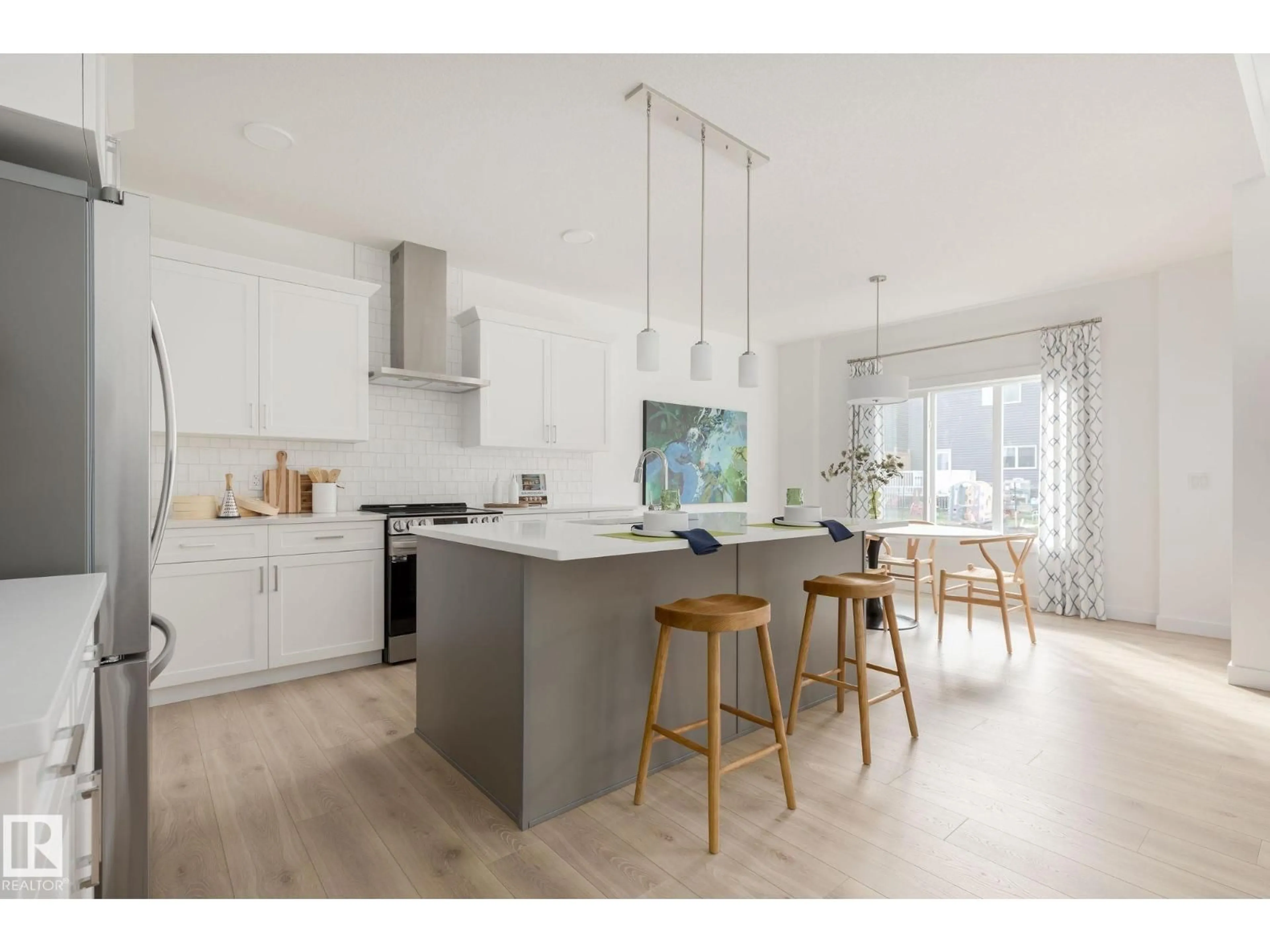 Open concept kitchen, wood/laminate floor for 17828 70 ST, Edmonton Alberta T5Z0T3