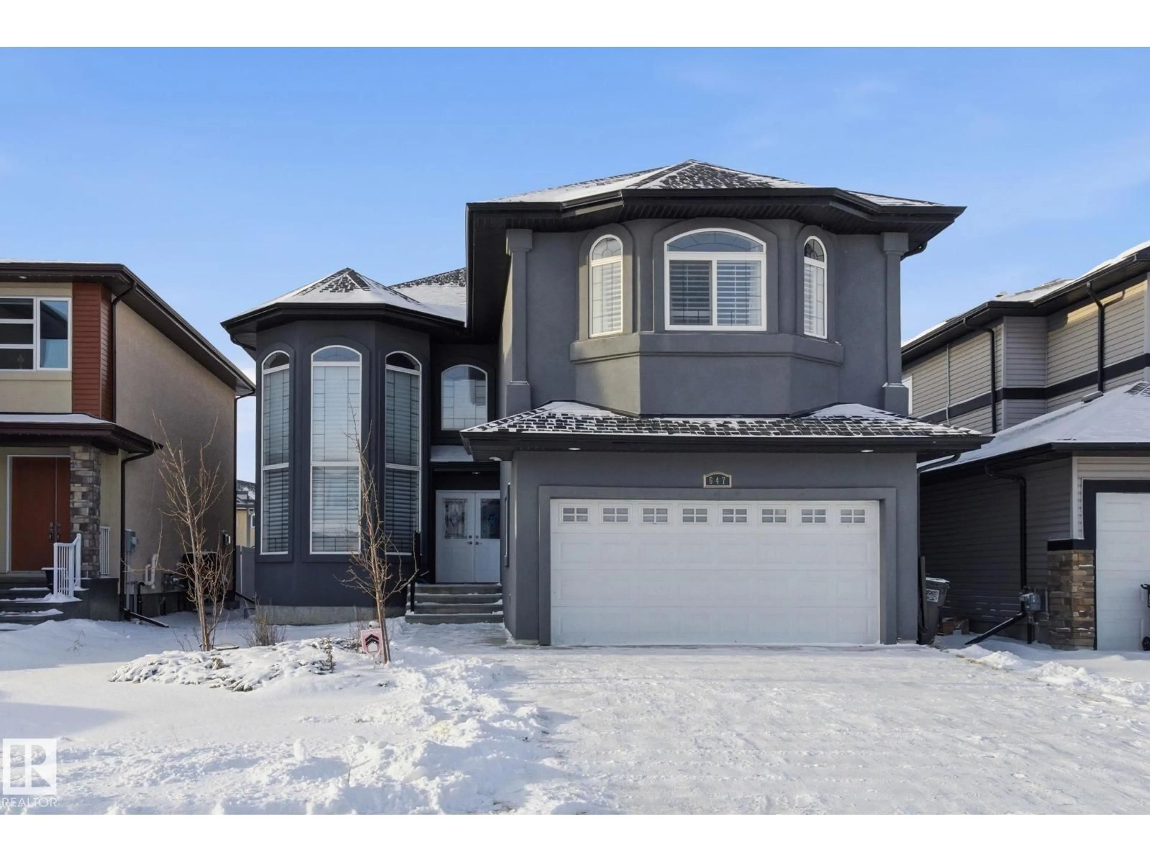 Home with vinyl exterior material, street for VS NW - 647 FRASER VISTA, Edmonton Alberta T5Y0V4