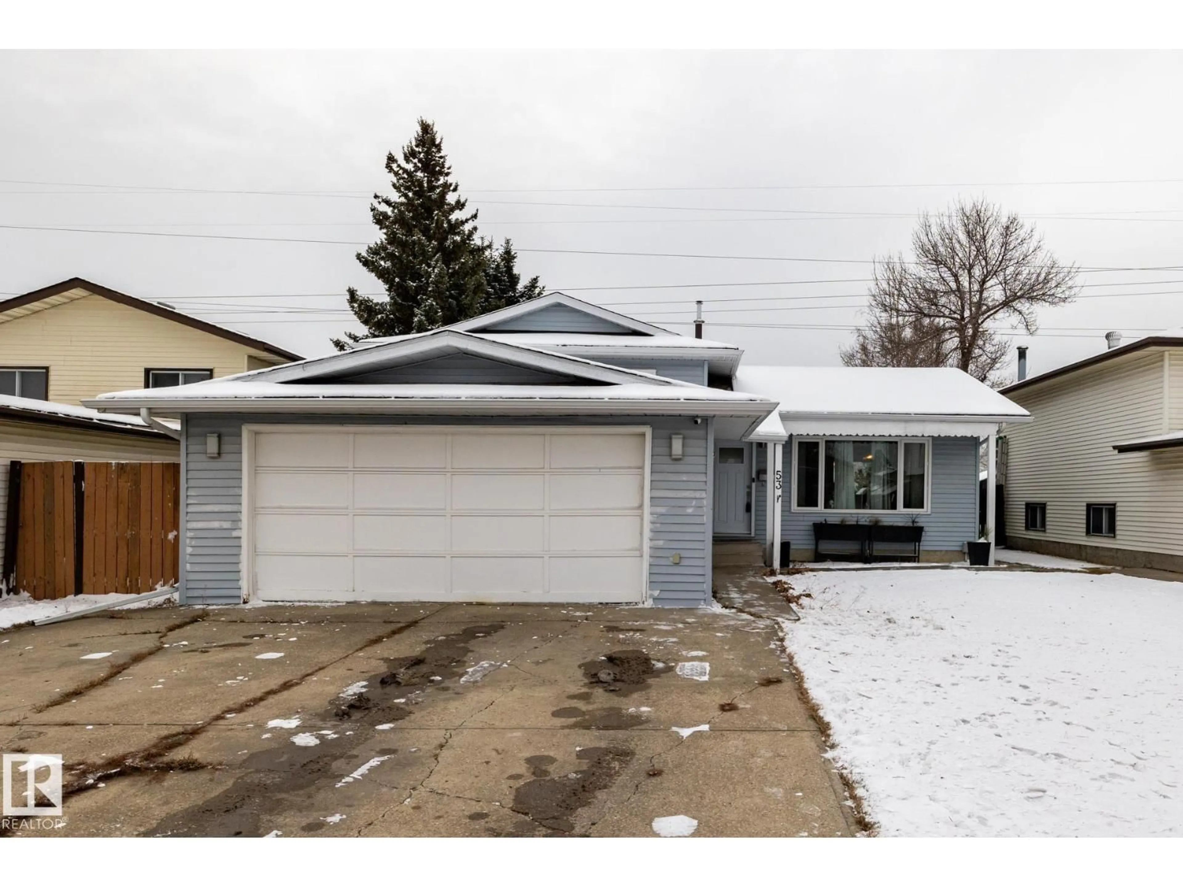 Home with vinyl exterior material, street for 53 WARWICK RD, Edmonton Alberta T5X4P5