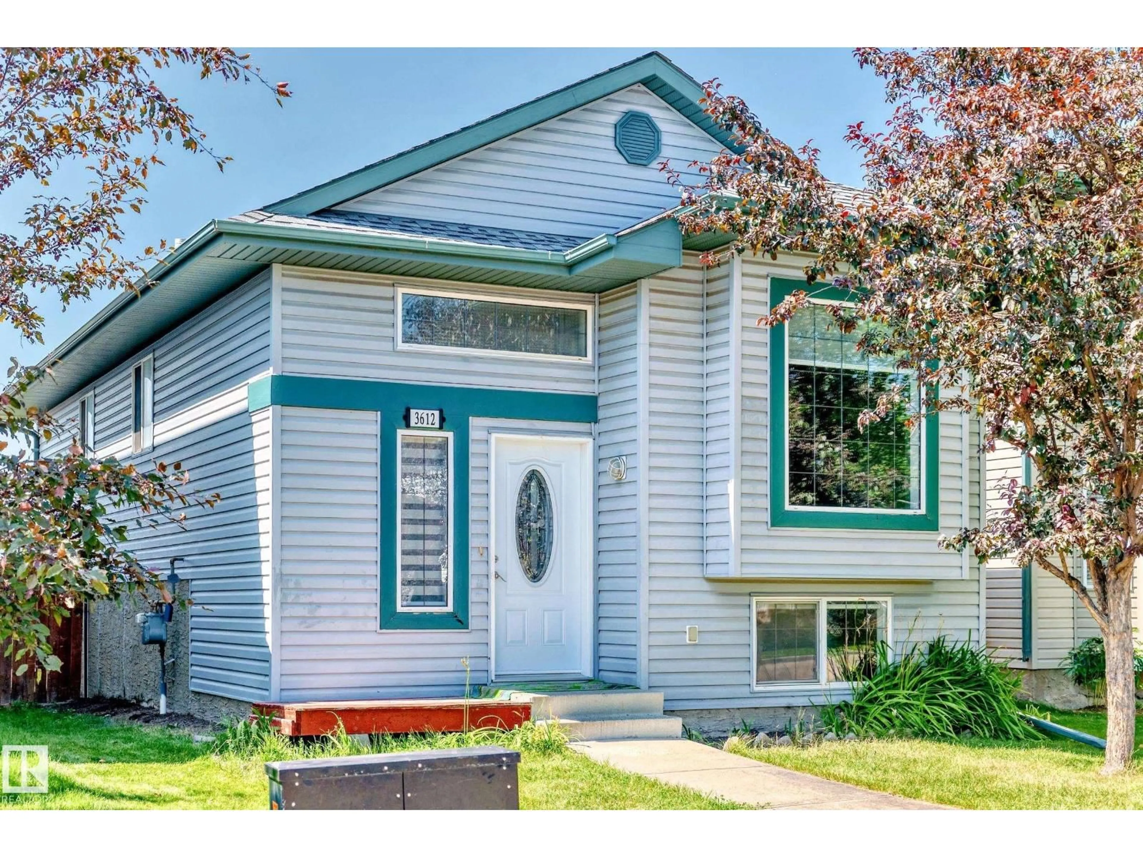 Home with vinyl exterior material, street for 3612 22 ST, Edmonton Alberta T6T1S1