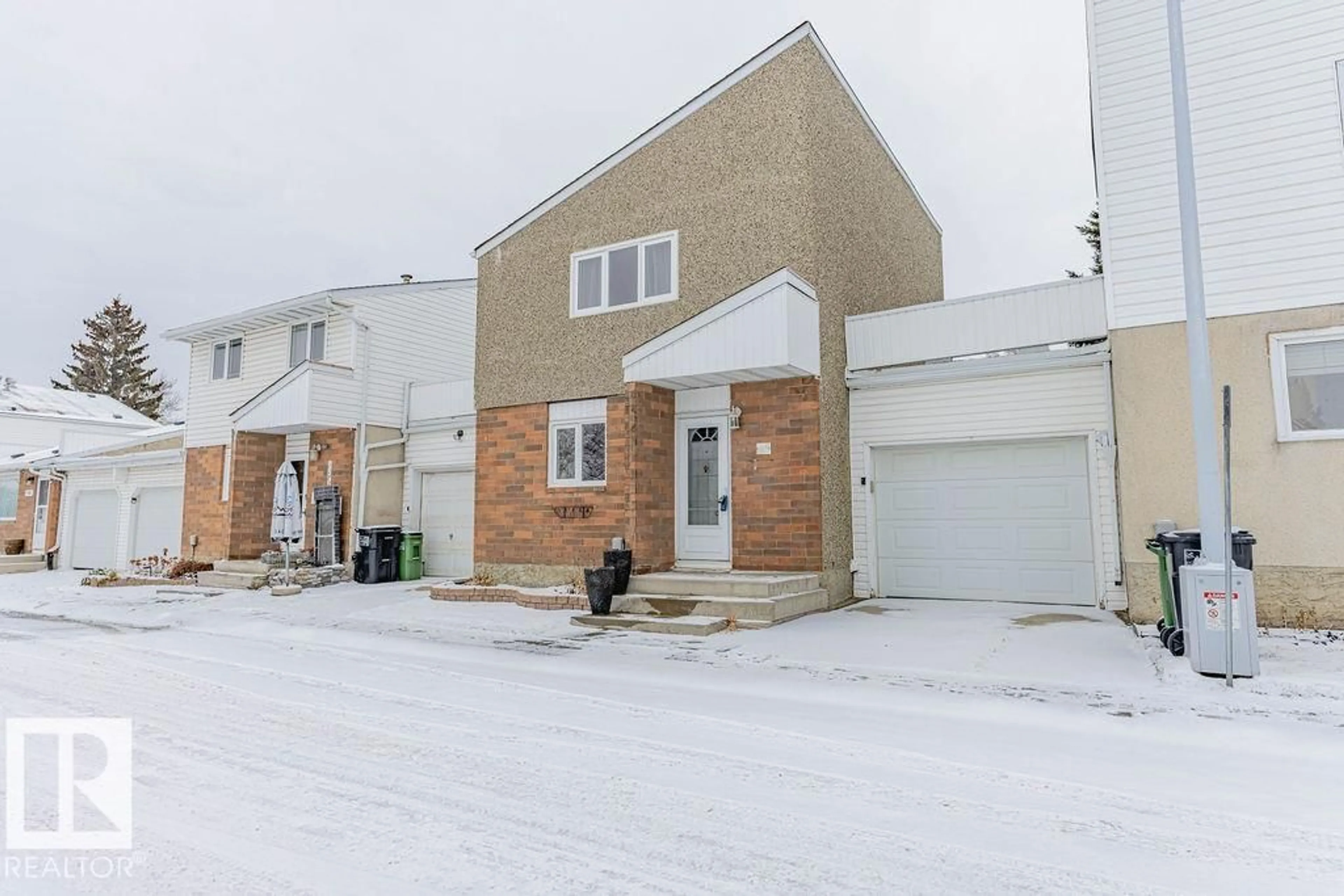 A pic from outside/outdoor area/front of a property/back of a property/a pic from drone, street for 1170 MILLBOURNE RD E NW, Edmonton Alberta T6K1W1