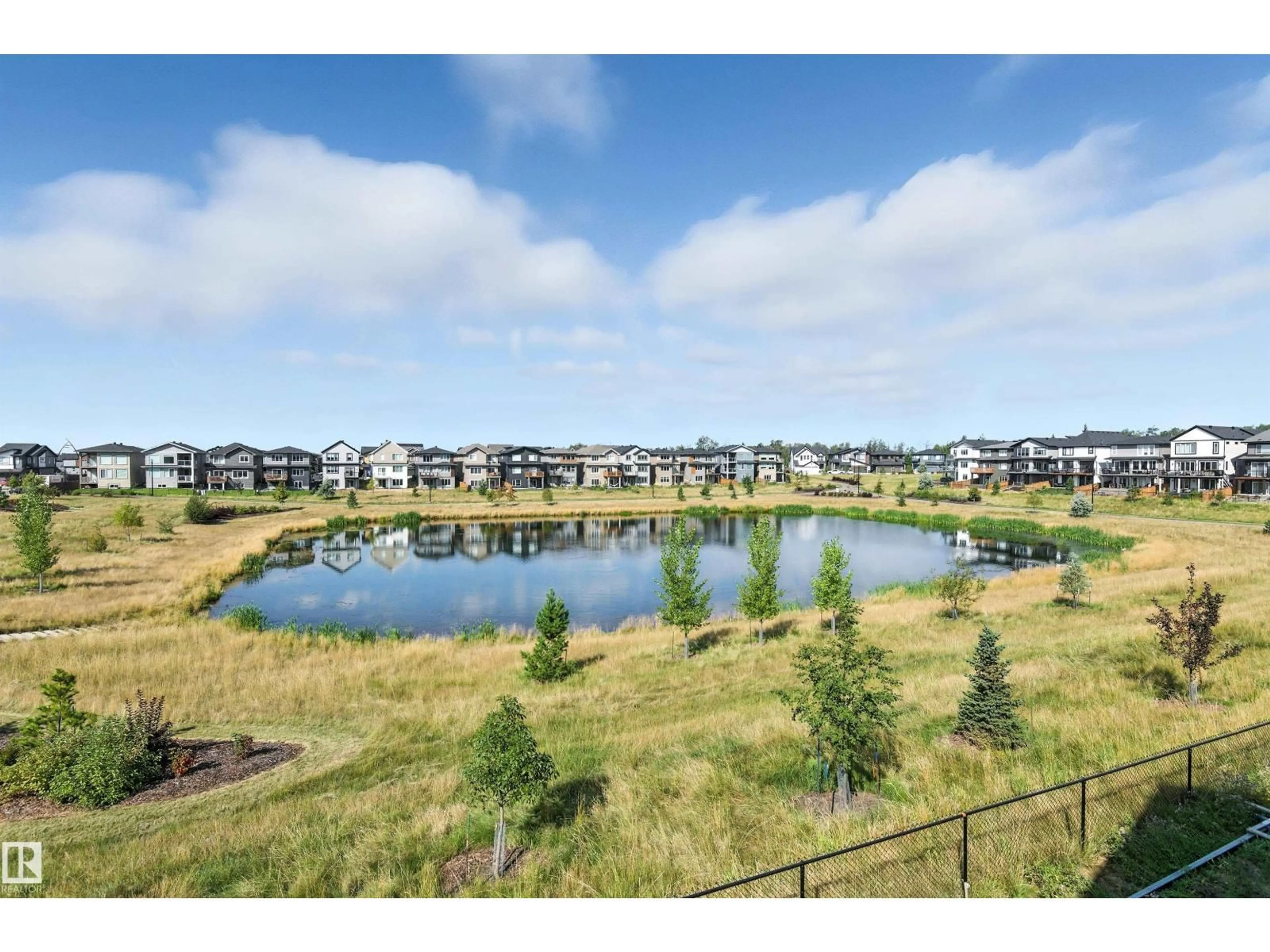 A pic from outside/outdoor area/front of a property/back of a property/a pic from drone, water/lake/river/ocean view for NW - 2520 206 ST, Edmonton Alberta T6M1P1