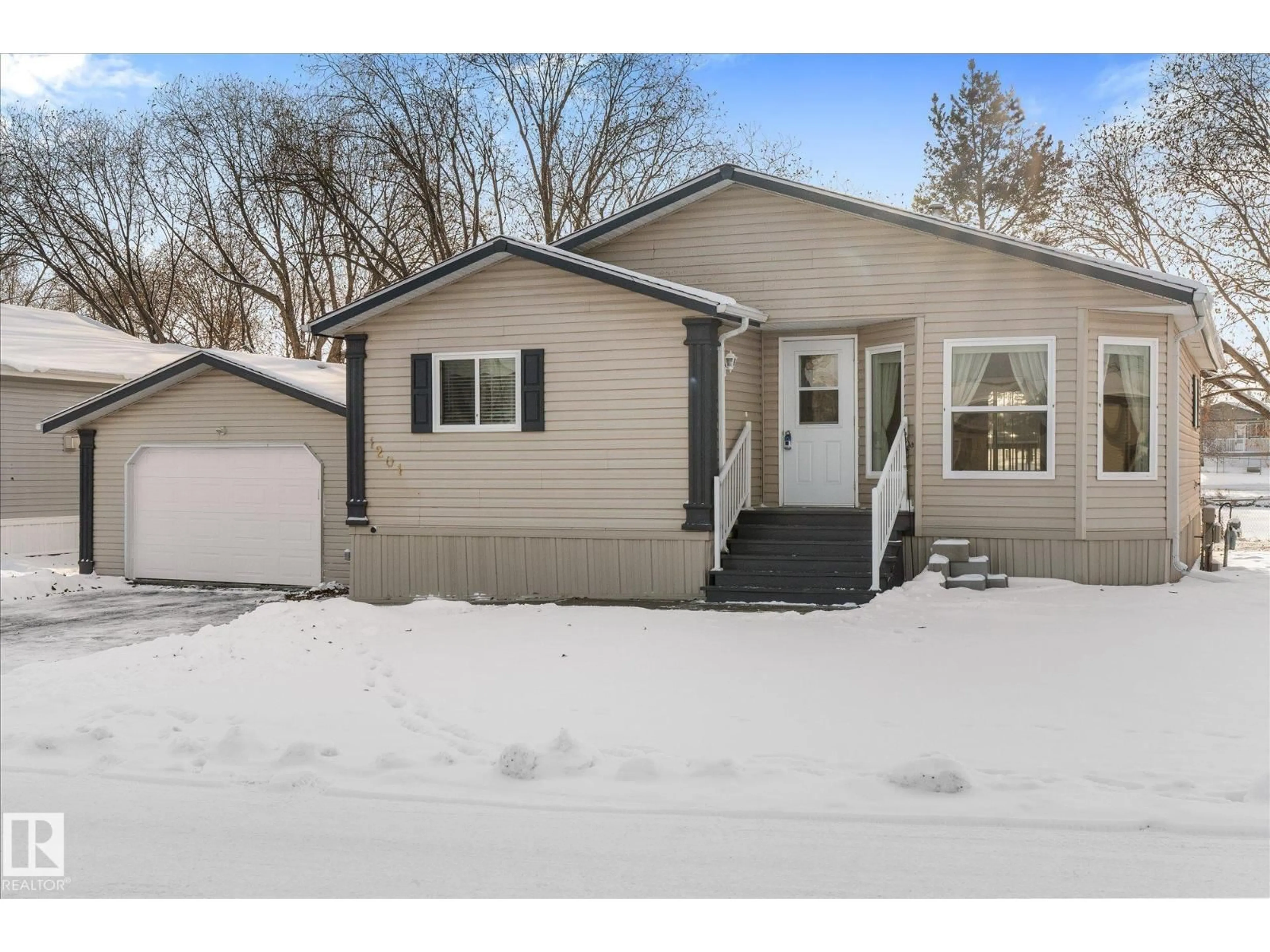 Home with vinyl exterior material, street for 53222 - 1201 RANGE ROAD 272, Rural Parkland County Alberta T7X4K4