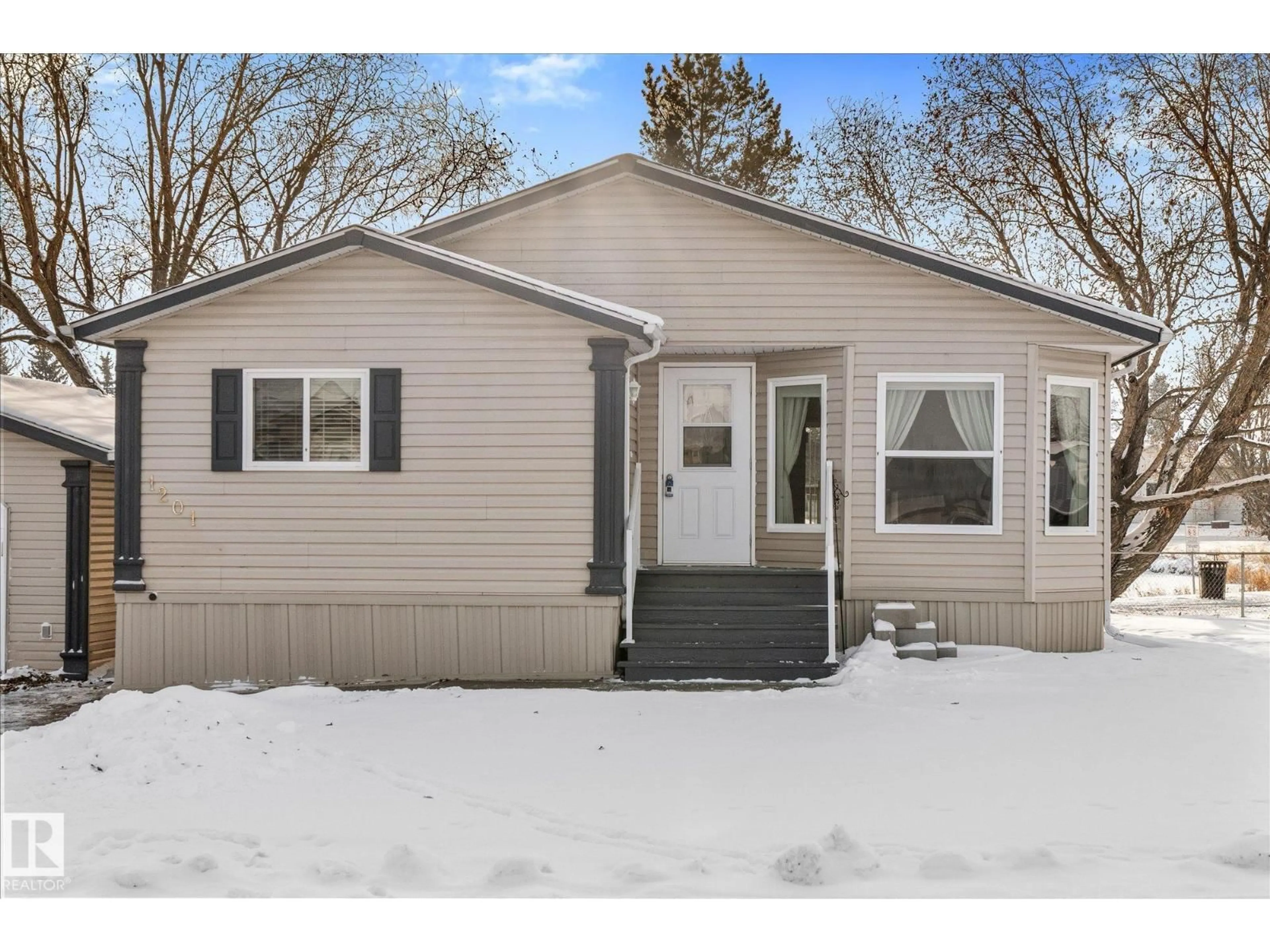 Home with vinyl exterior material, street for 53222 - 1201 RANGE ROAD 272, Rural Parkland County Alberta T7X4K4