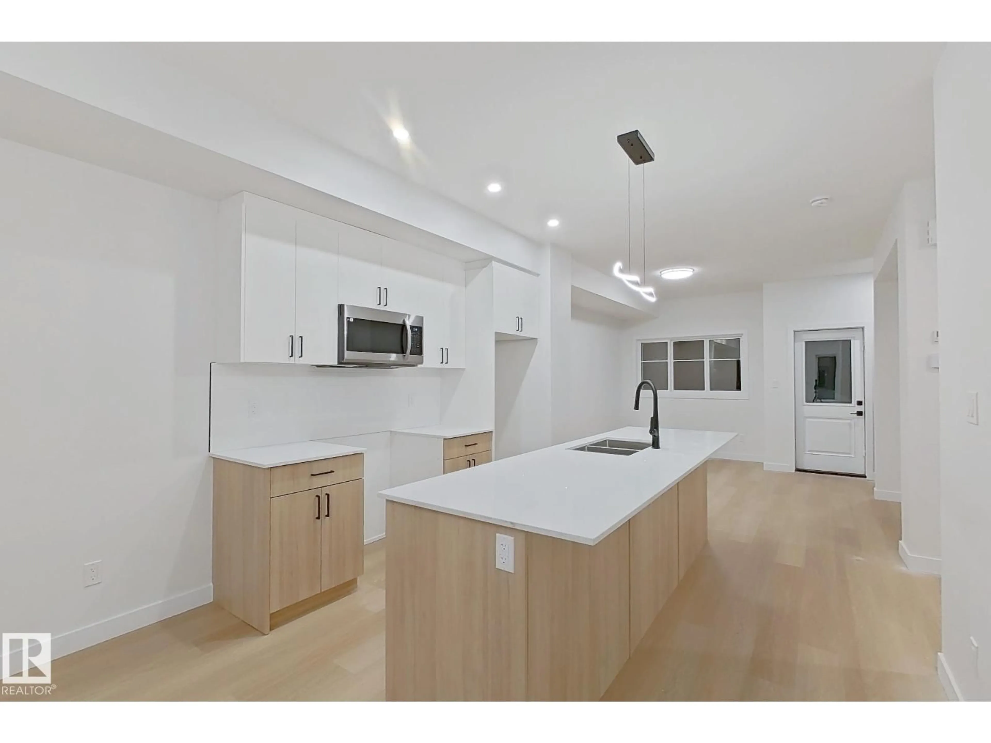 Open concept kitchen, unknown for #65 - 18120 28 AV, Edmonton Alberta T6W4V2