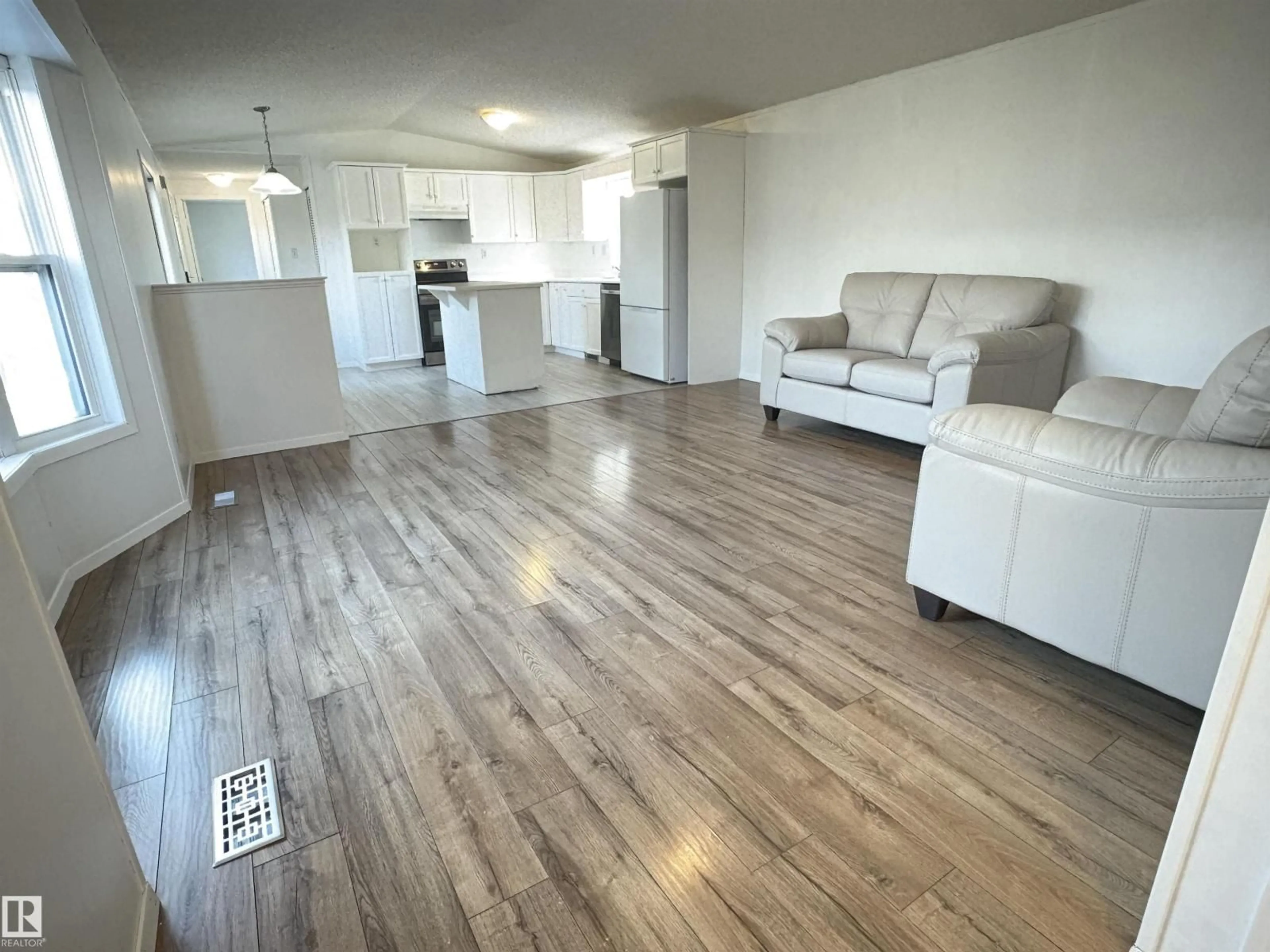 Living room with furniture, wood/laminate floor for #1220 - 1220 RANGE ROAD 272, Rural Parkland County Alberta T7X4K4