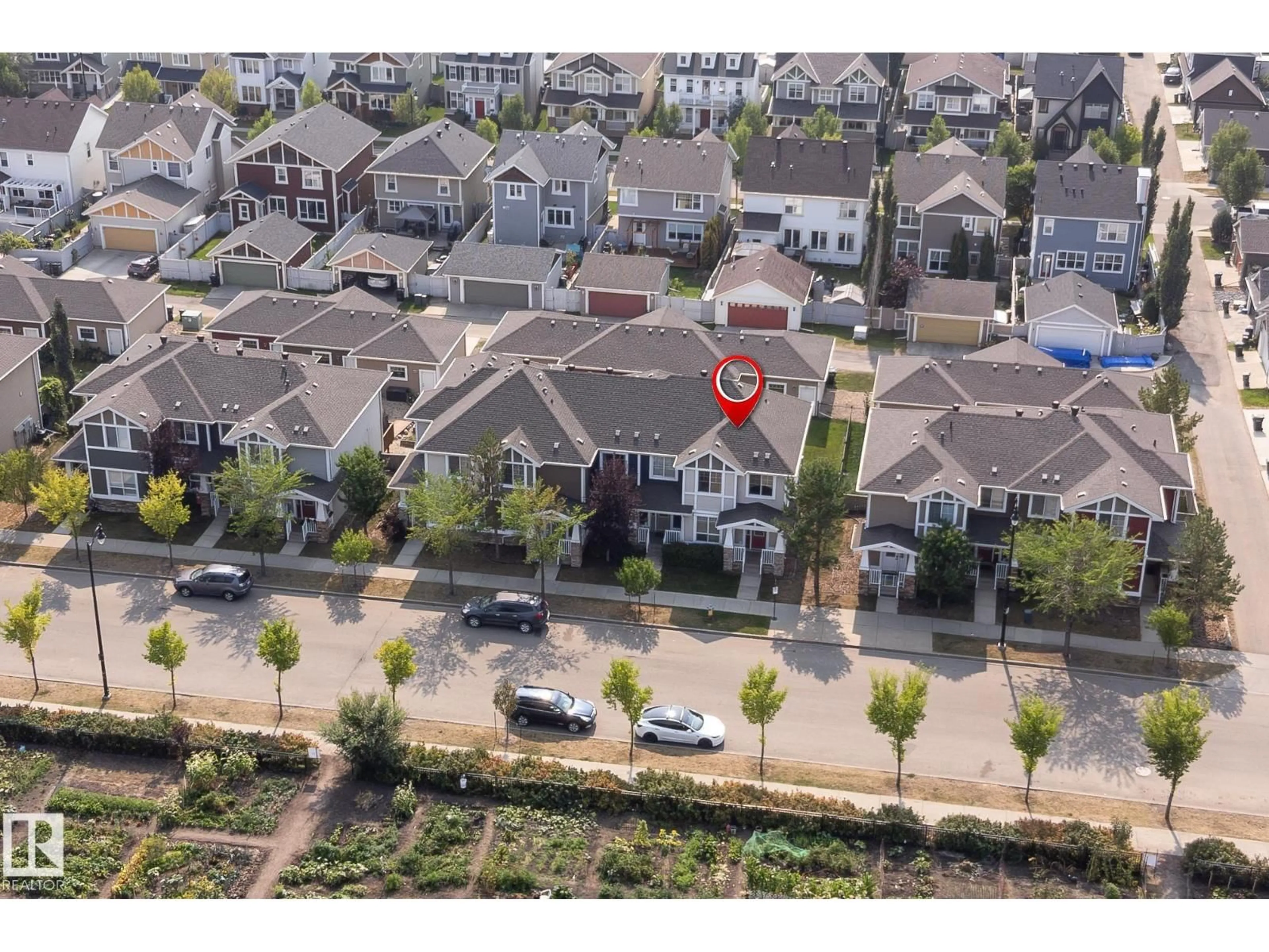 A pic from outside/outdoor area/front of a property/back of a property/a pic from drone, street for 2687 SIR ARTHUR CURRIE WY, Edmonton Alberta T5E6S8