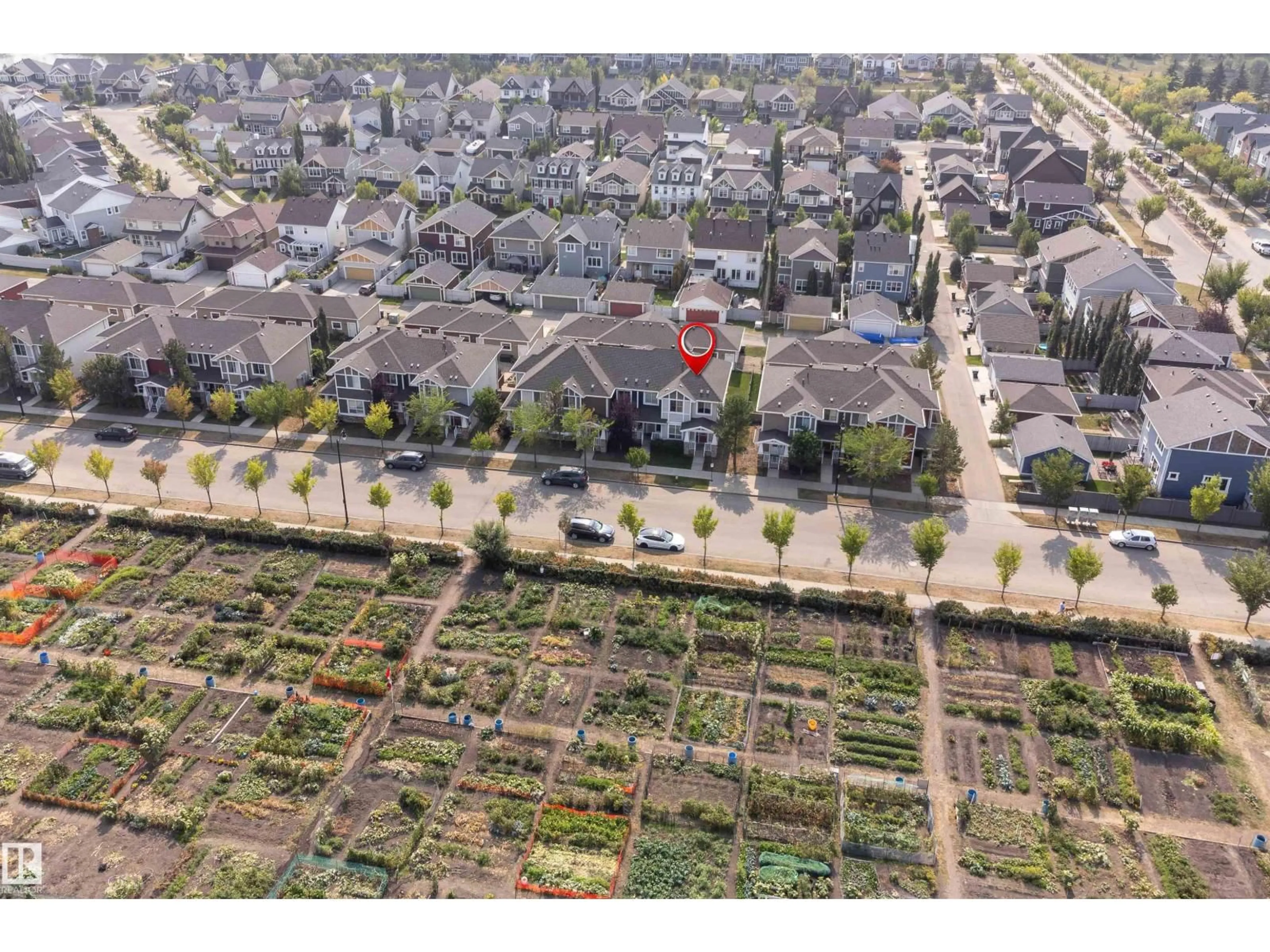 A pic from outside/outdoor area/front of a property/back of a property/a pic from drone, street for 2687 SIR ARTHUR CURRIE WY, Edmonton Alberta T5E6S8