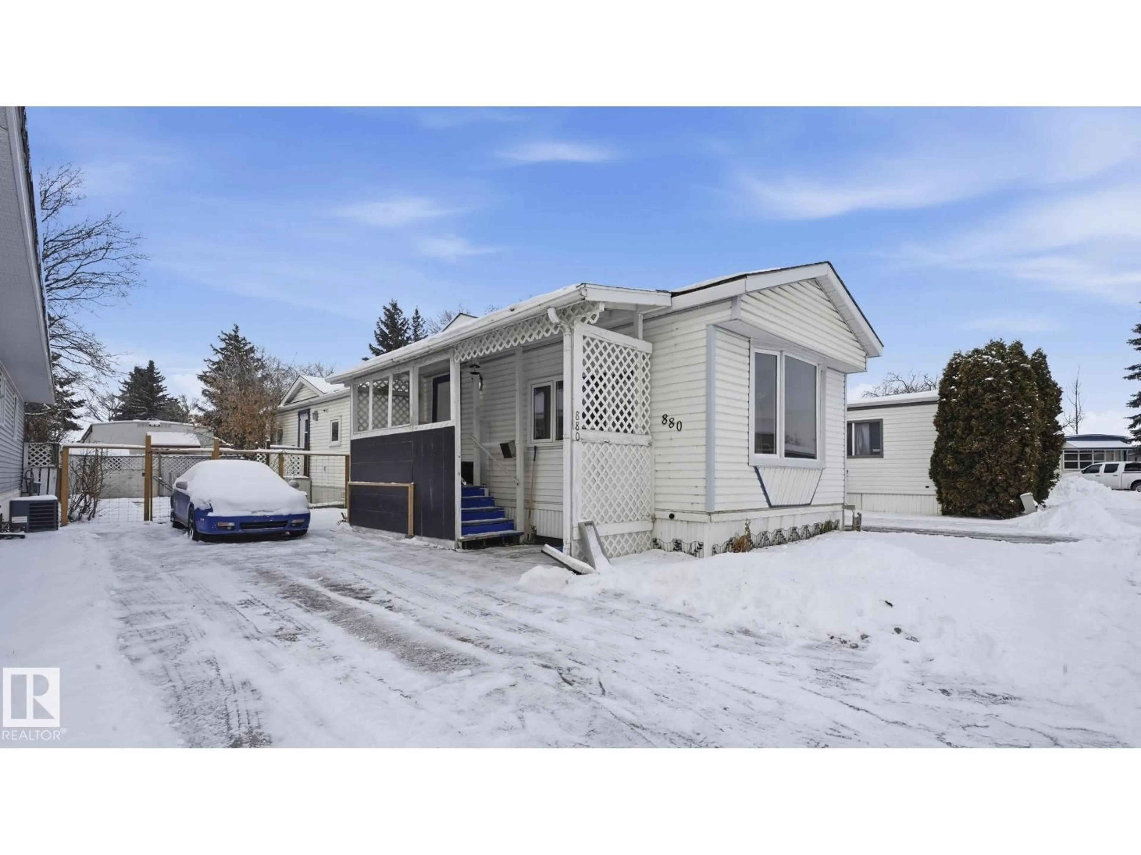 Home with vinyl exterior material, street for 880 WEST COAST BAY NW, Edmonton Alberta T5S1T7