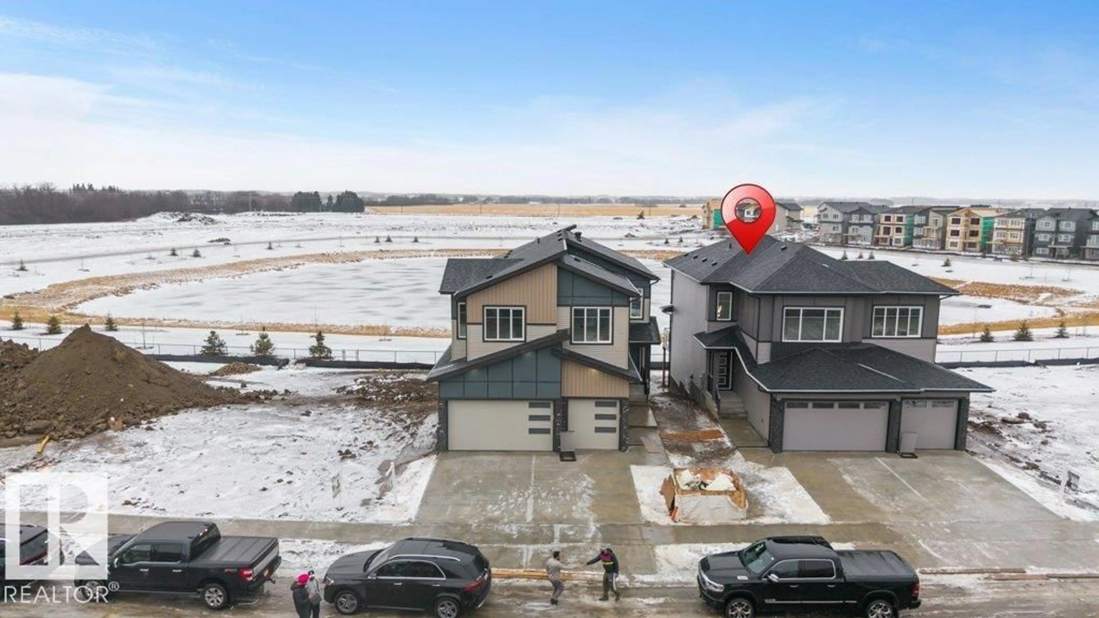 A pic from outside/outdoor area/front of a property/back of a property/a pic from drone, water/lake/river/ocean view for 219 CRYSTAL CREEK DR, Leduc Alberta T9E0X6