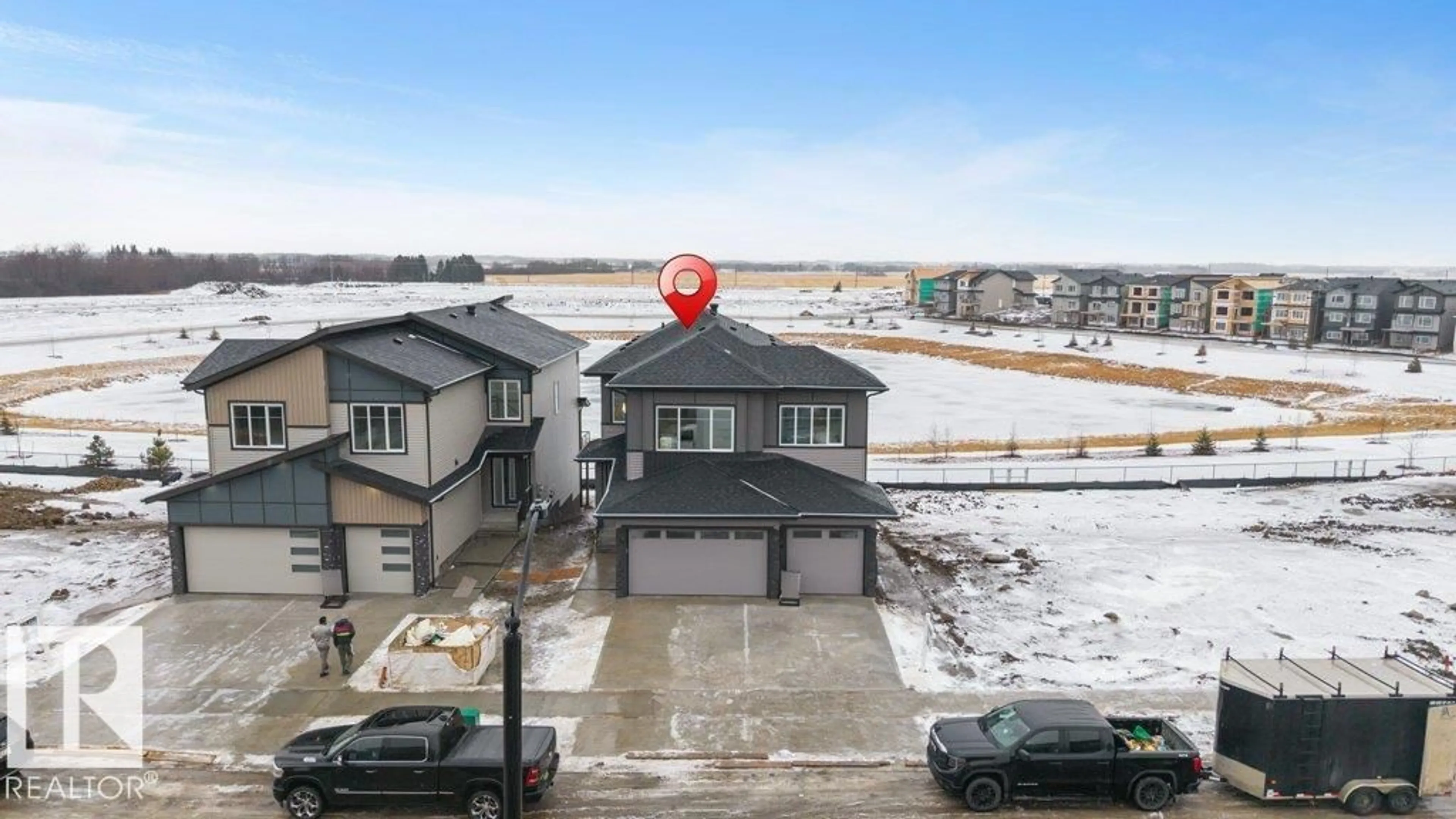 A pic from outside/outdoor area/front of a property/back of a property/a pic from drone, water/lake/river/ocean view for 219 CRYSTAL CREEK DR, Leduc Alberta T9E0X6