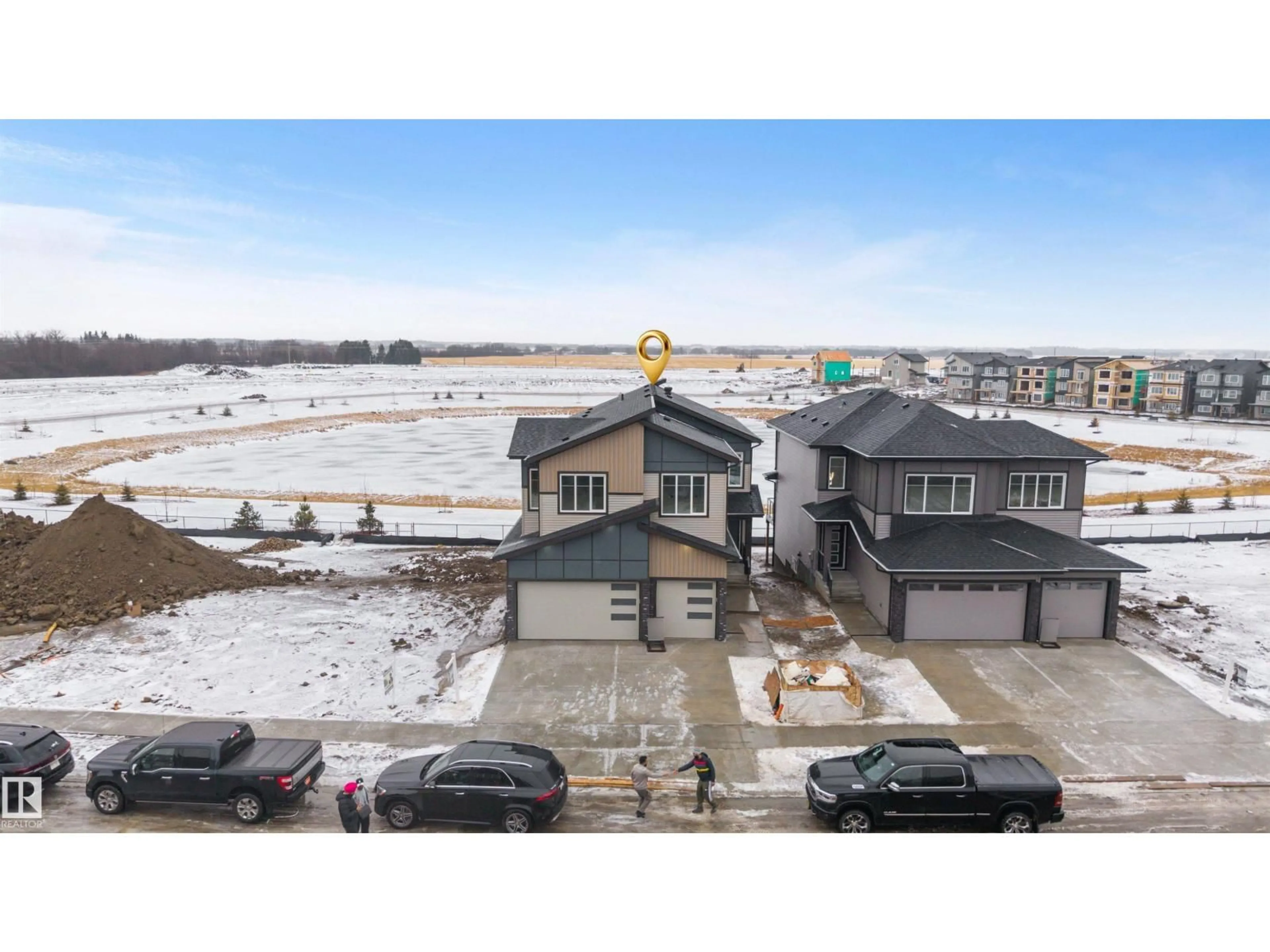 A pic from outside/outdoor area/front of a property/back of a property/a pic from drone, water/lake/river/ocean view for 221 CRYSTAL CREEK DR, Leduc Alberta T9E0X6