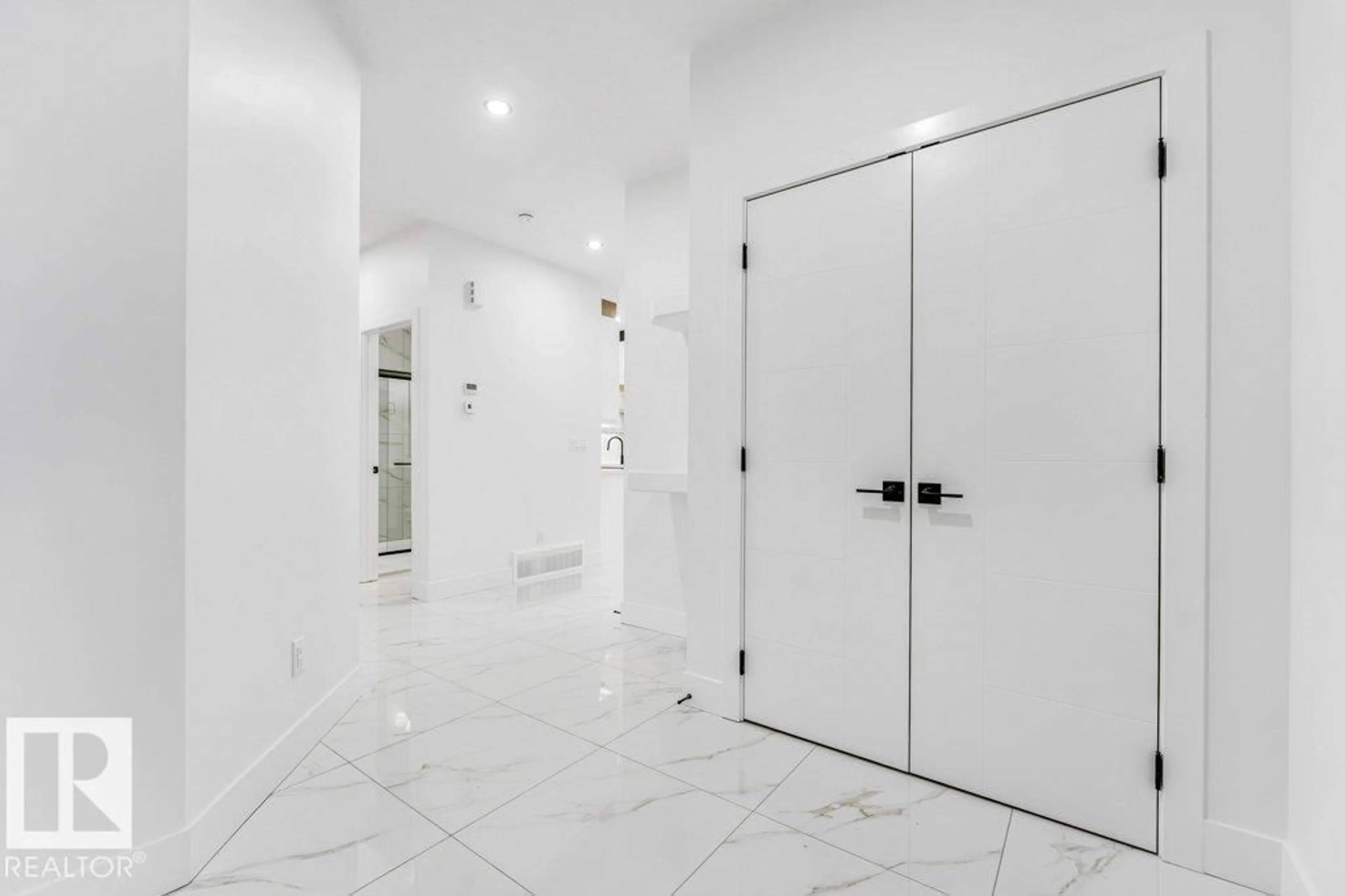 Indoor foyer for 221 CRYSTAL CREEK DR, Leduc Alberta T9E0X6