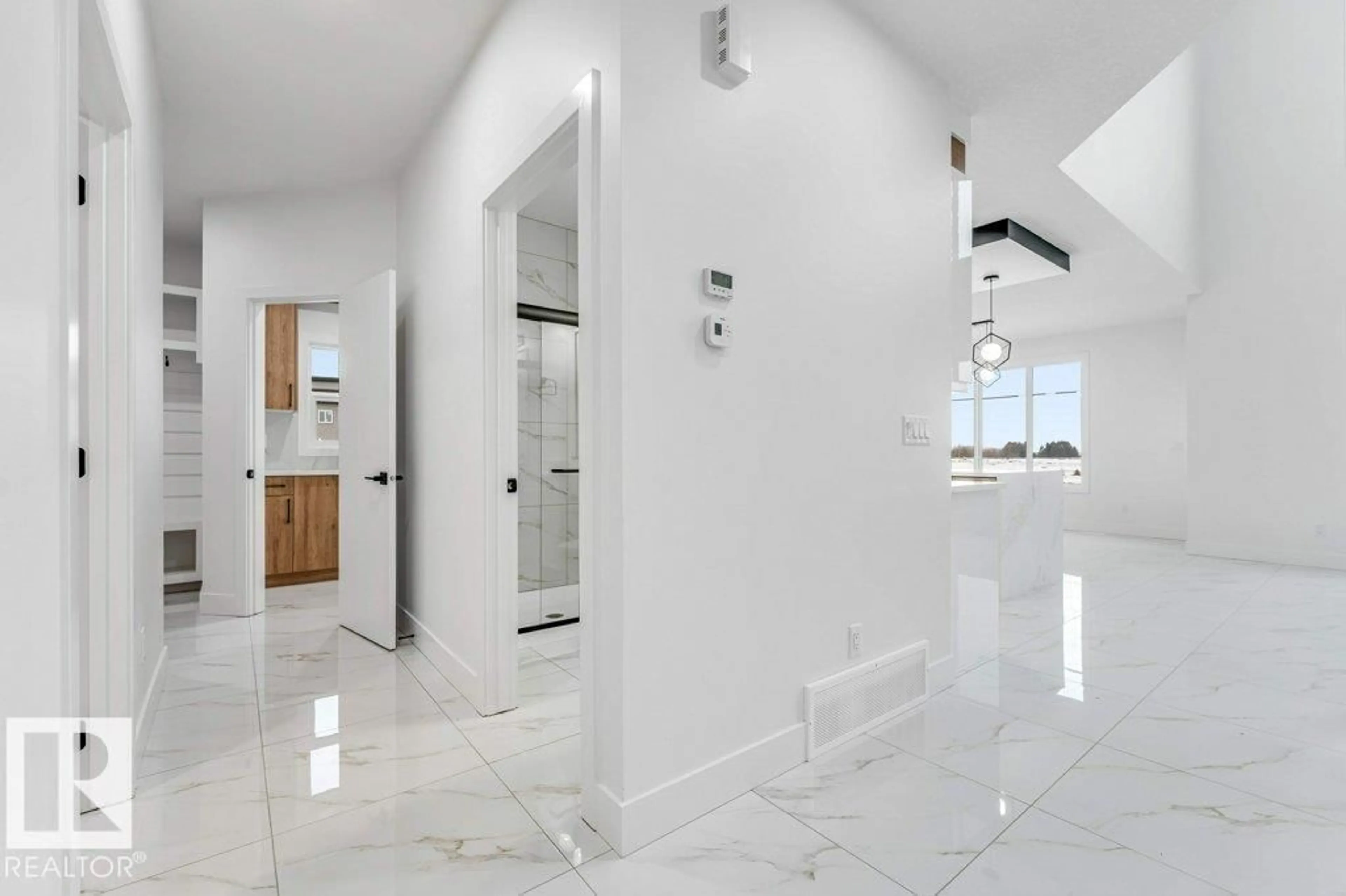 Indoor foyer for 221 CRYSTAL CREEK DR, Leduc Alberta T9E0X6