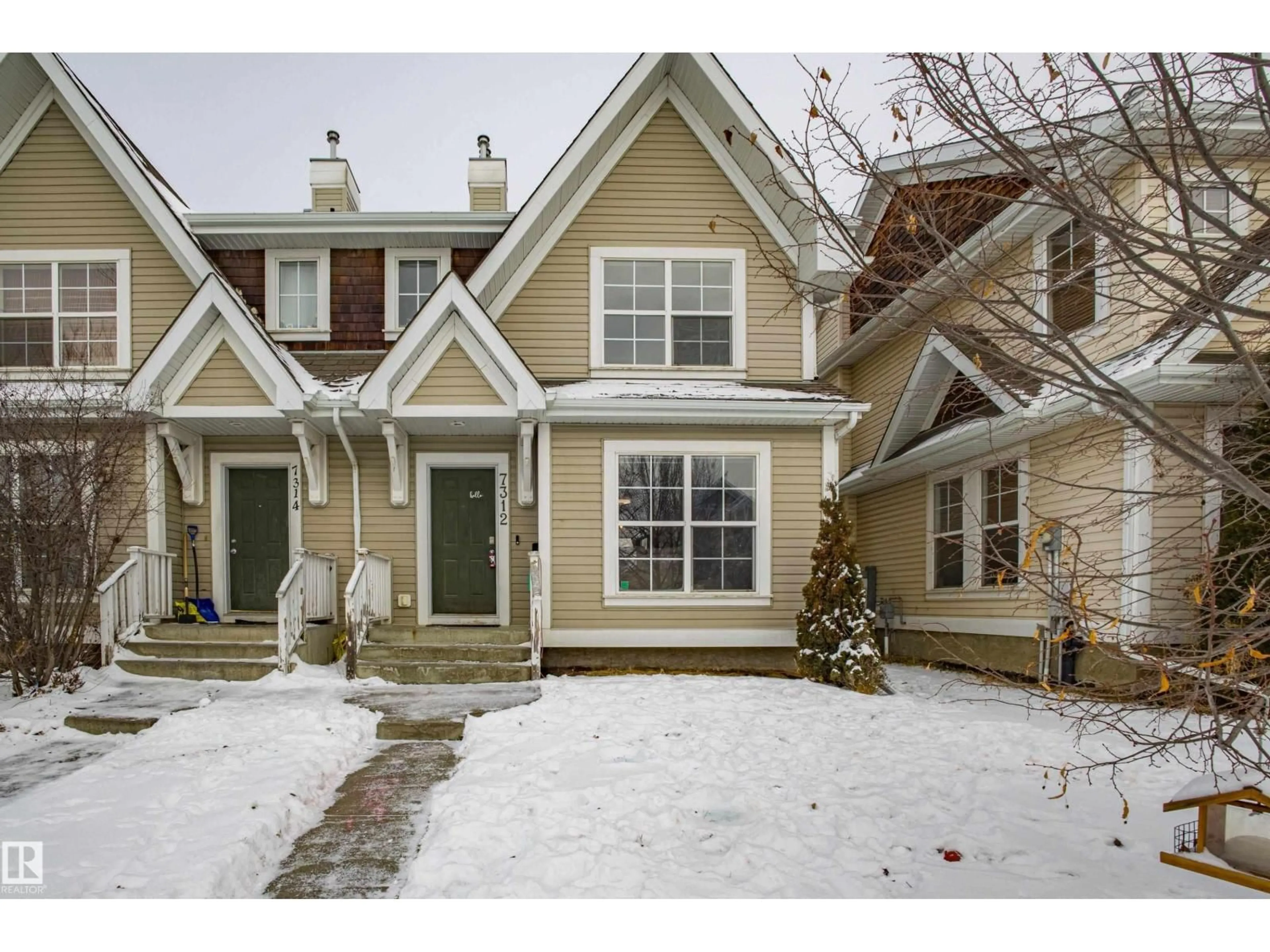 Home with vinyl exterior material, street for SW - 7312 19A AV, Edmonton Alberta T6X0K3