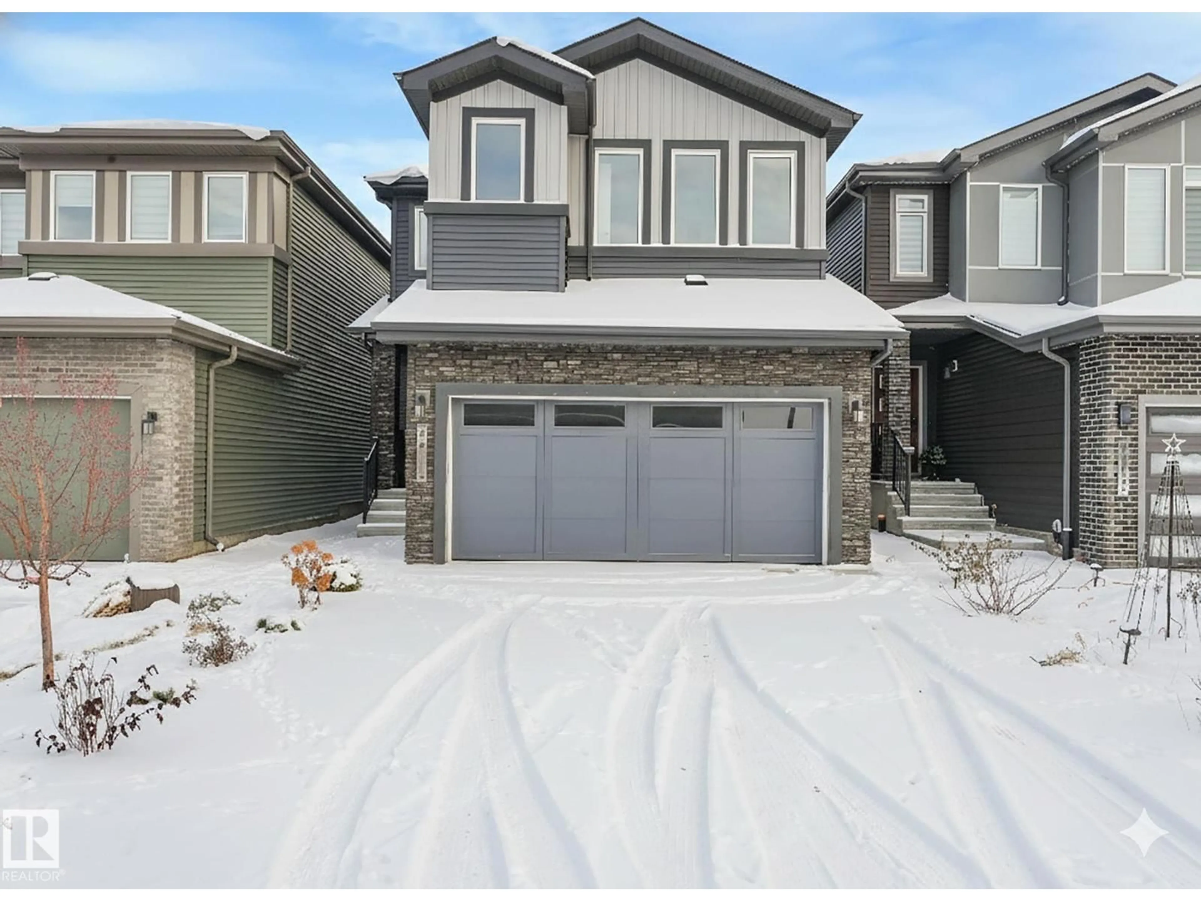 Home with vinyl exterior material, street for 5611 KOOTOOK PL, Edmonton Alberta T6W4Z5