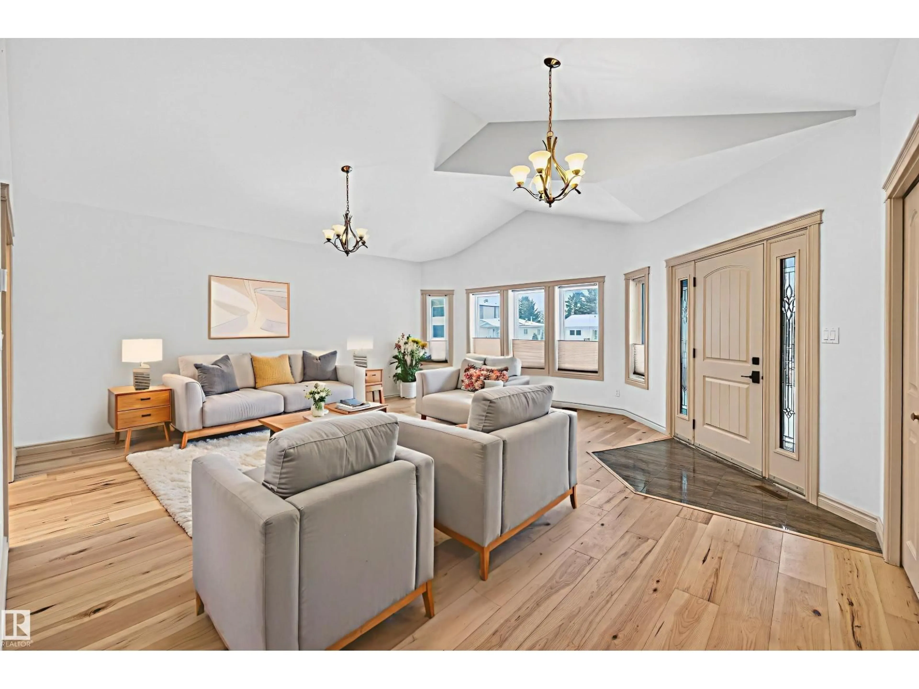 Living room with furniture, wood/laminate floor for 9328 152 ST, Edmonton Alberta T5R1M9