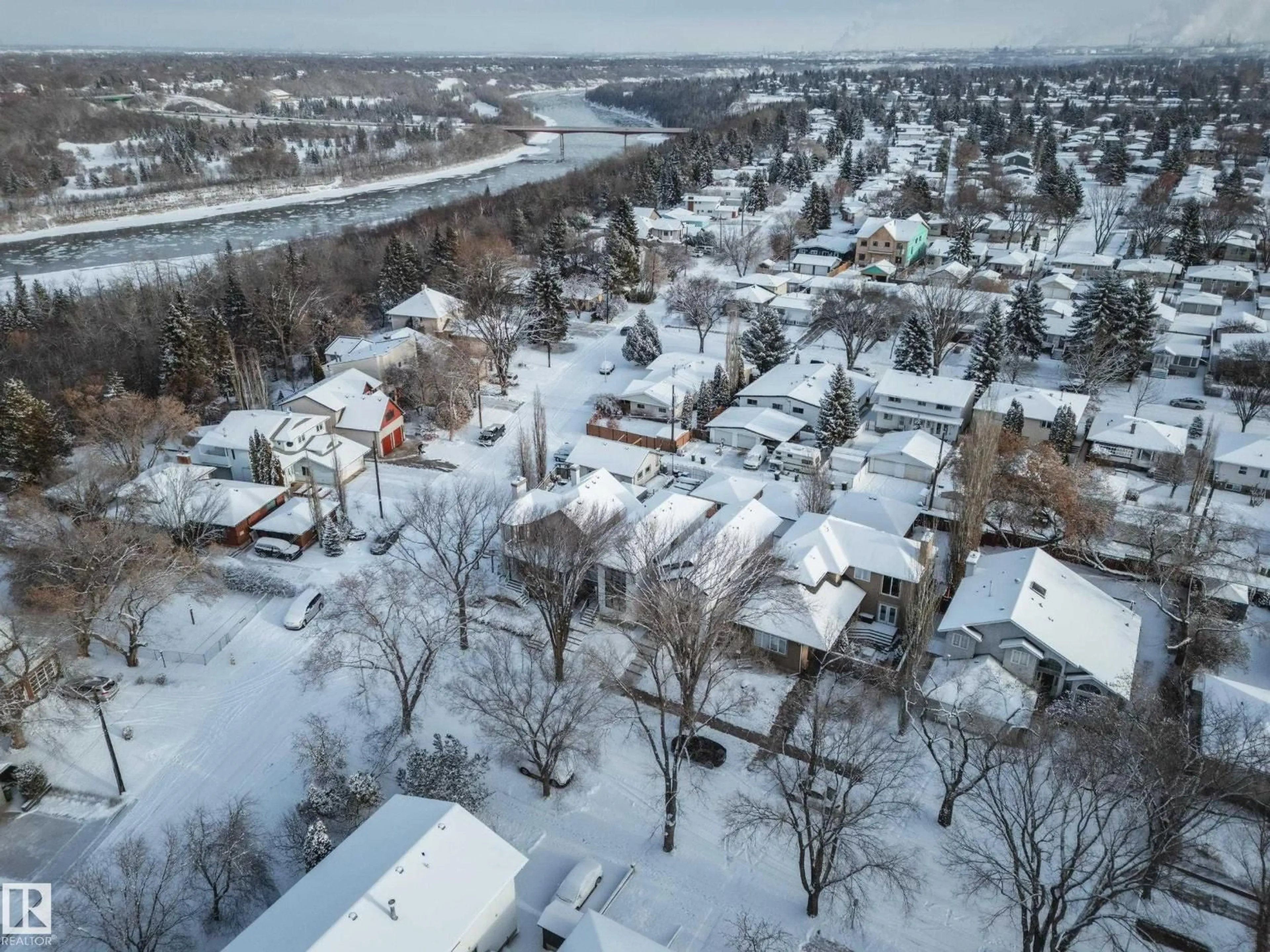A pic from outside/outdoor area/front of a property/back of a property/a pic from drone, street for 10649 81 ST, Edmonton Alberta T6A3W7