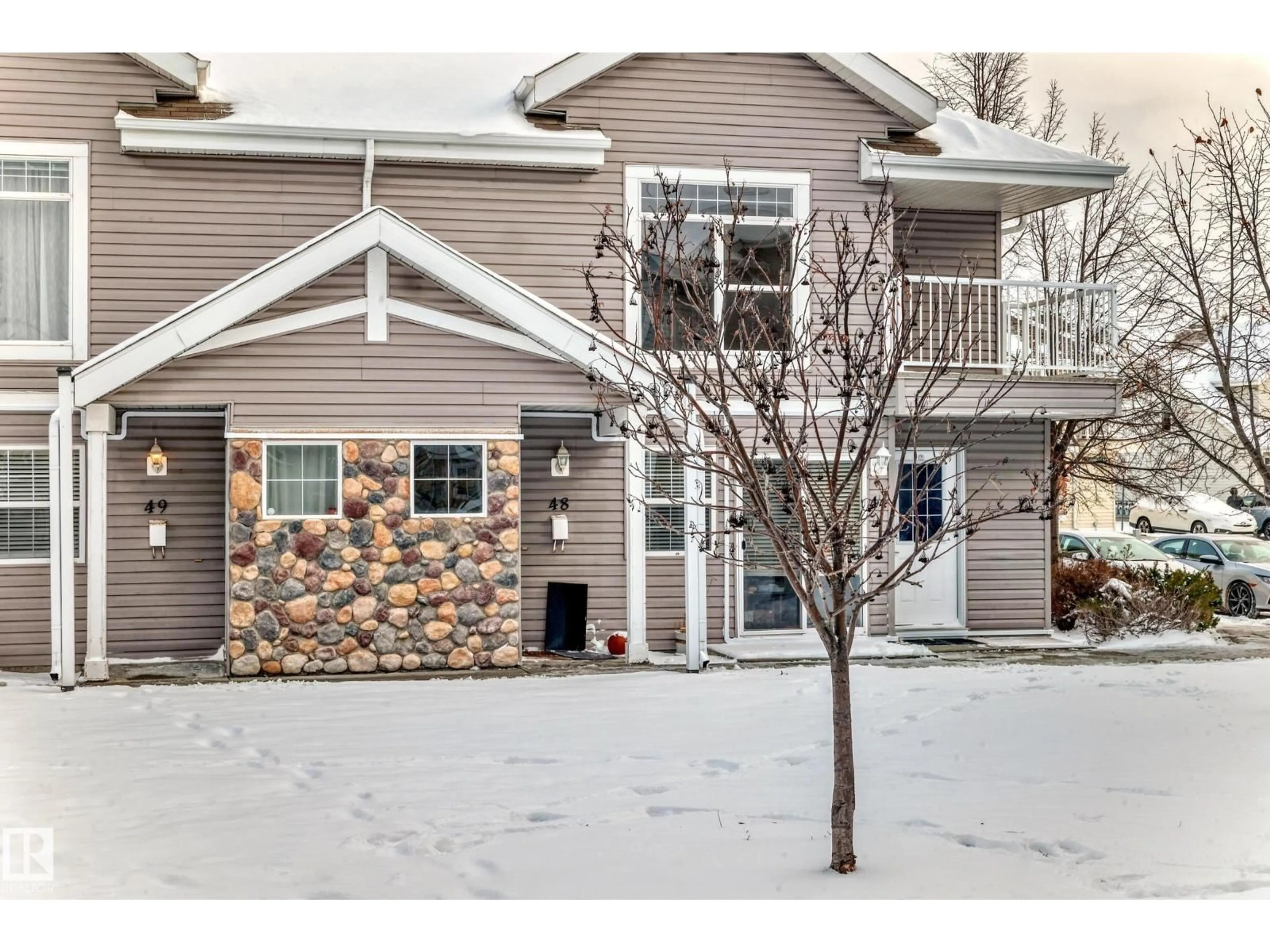 Home with brick exterior material, street for 150 - 48 EDWARDS DR, Edmonton Alberta T6X1M4