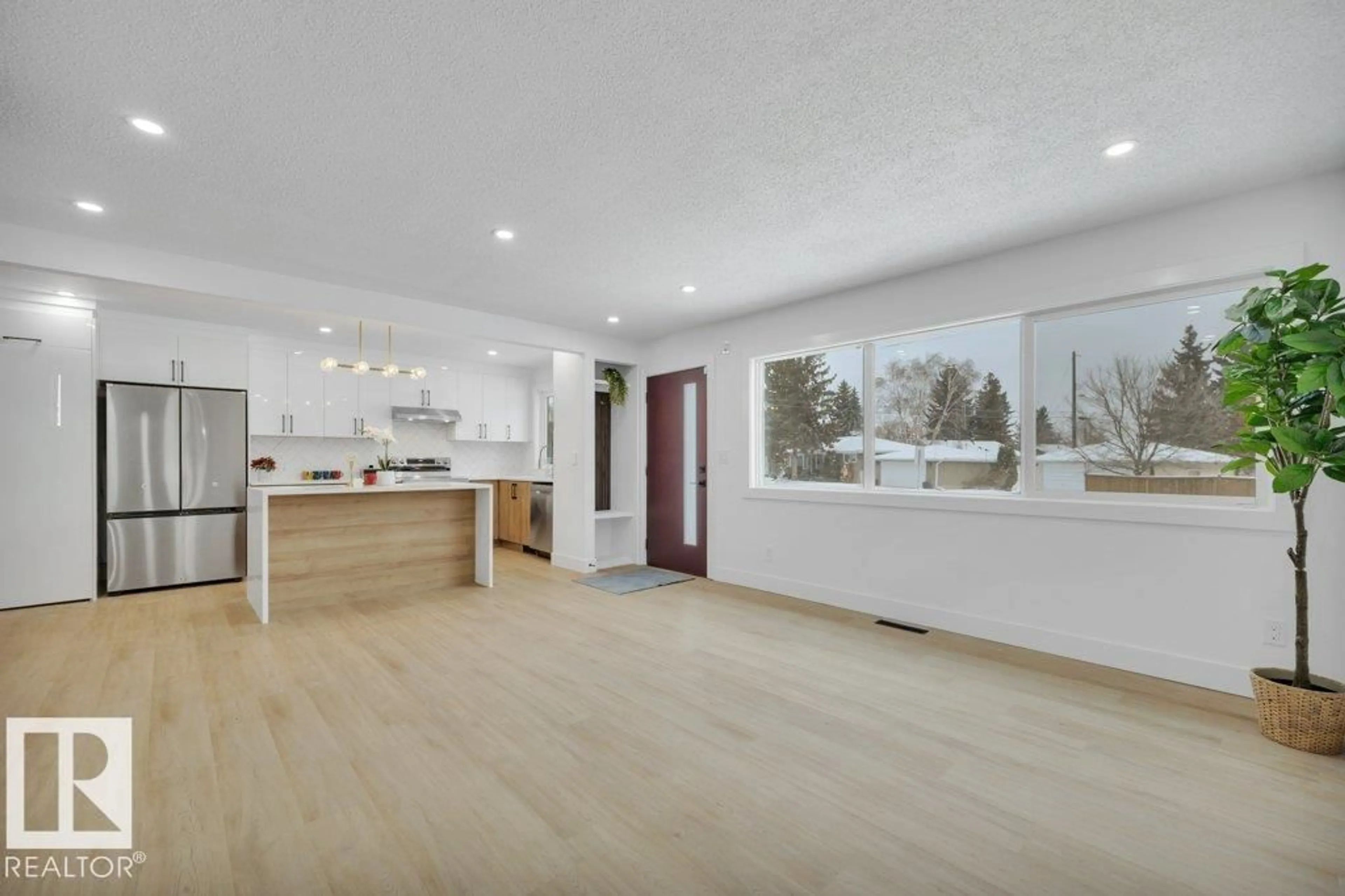 Open concept kitchen, wood/laminate floor for NW - 8506 153 ST, Edmonton Alberta T5R1N7