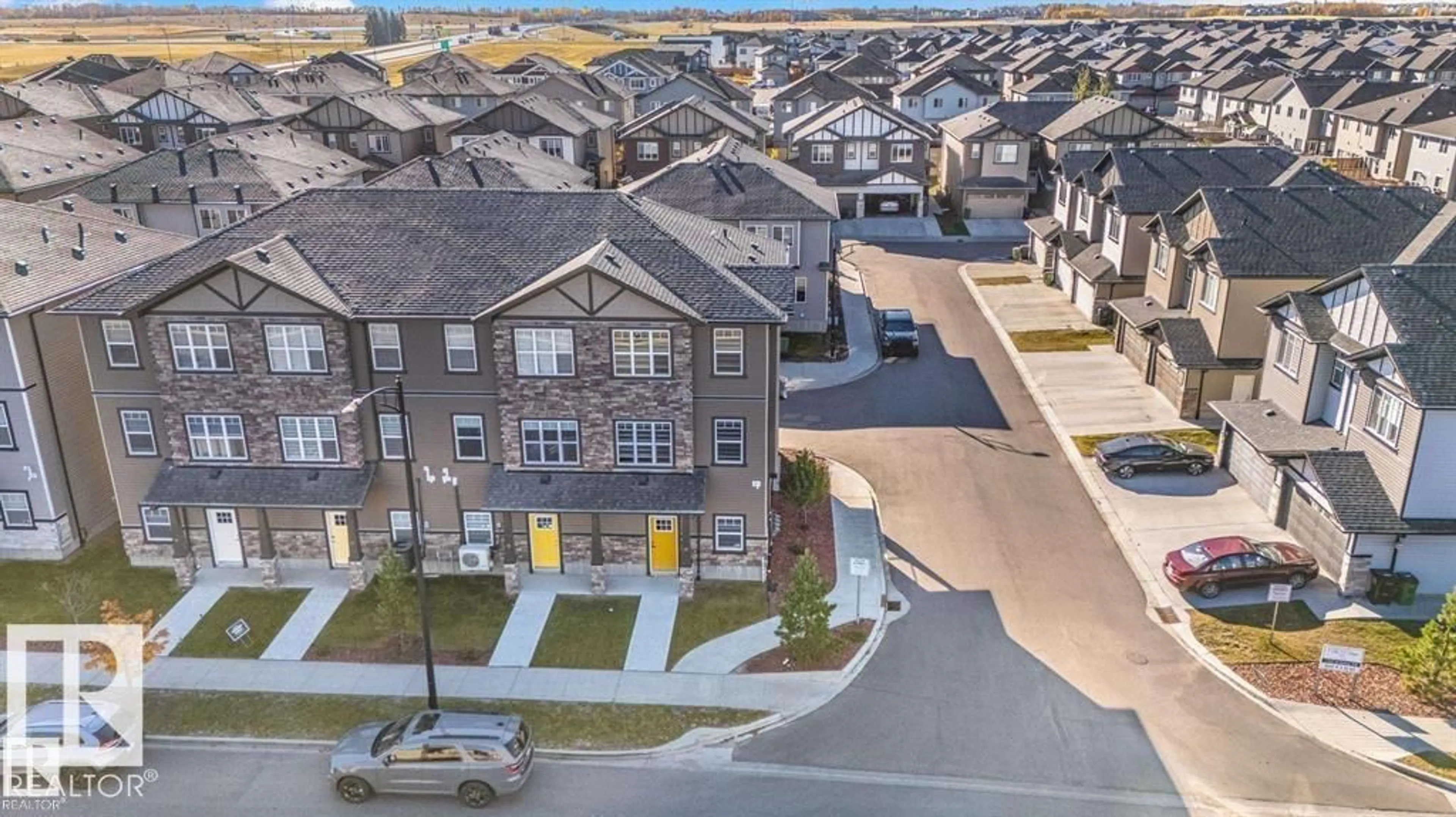 A pic from outside/outdoor area/front of a property/back of a property/a pic from drone, street for #19 - 1703 16 AVE AV, Edmonton Alberta T6T2C3