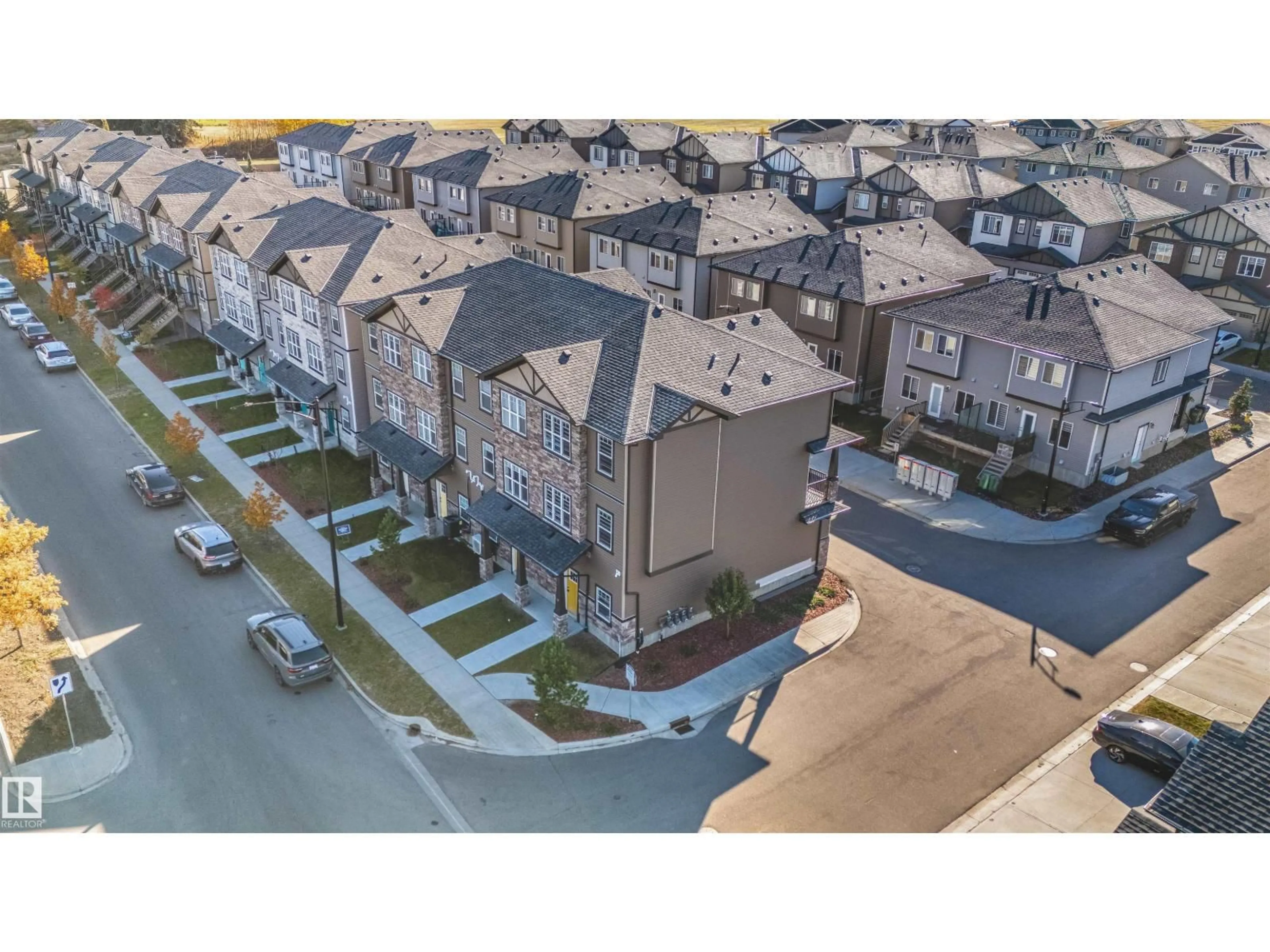 A pic from outside/outdoor area/front of a property/back of a property/a pic from drone, street for #19 - 1703 16 AVE AV, Edmonton Alberta T6T2C3