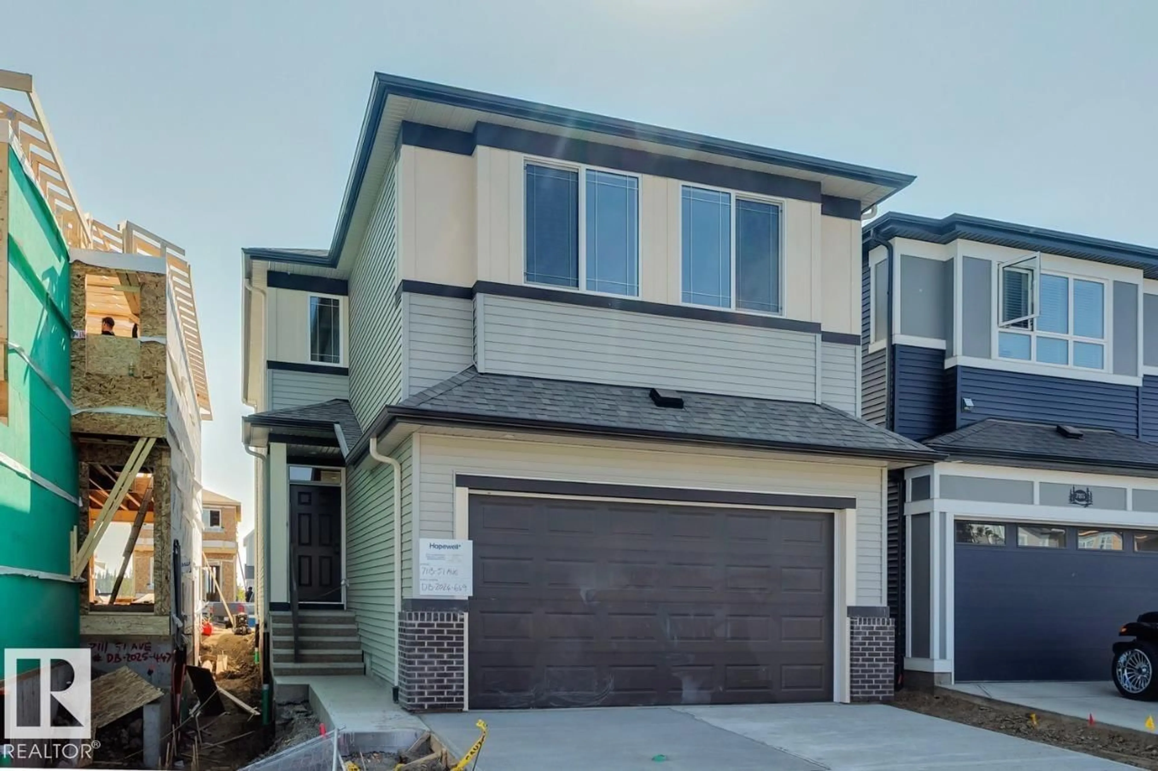 Home with vinyl exterior material, street for 7113 51 AV, Beaumont Alberta T4X3E5