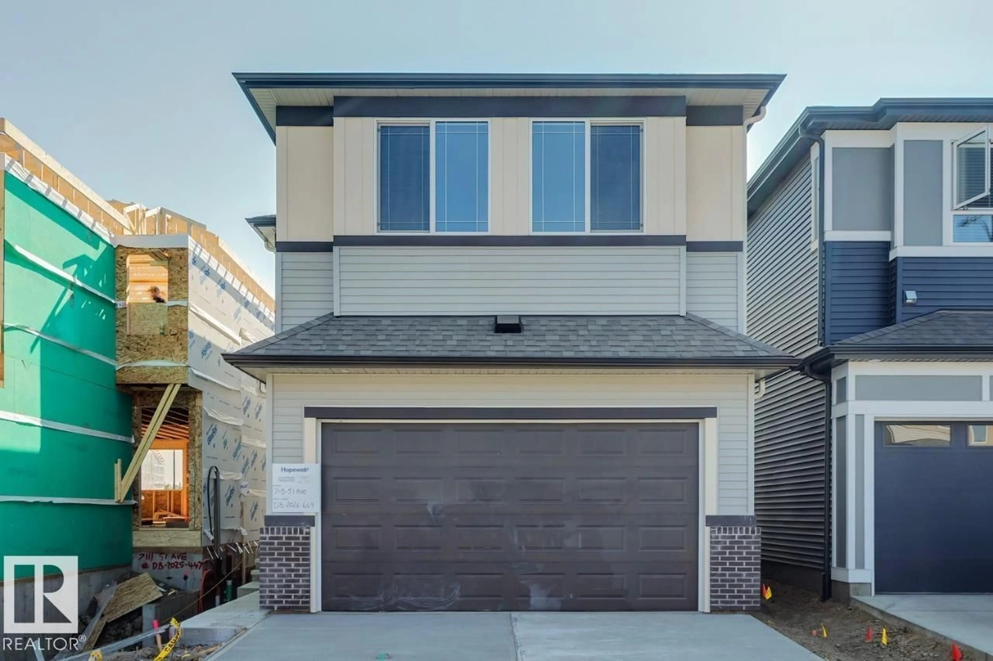 Home with vinyl exterior material, street for 7113 51 AV, Beaumont Alberta T4X3E5