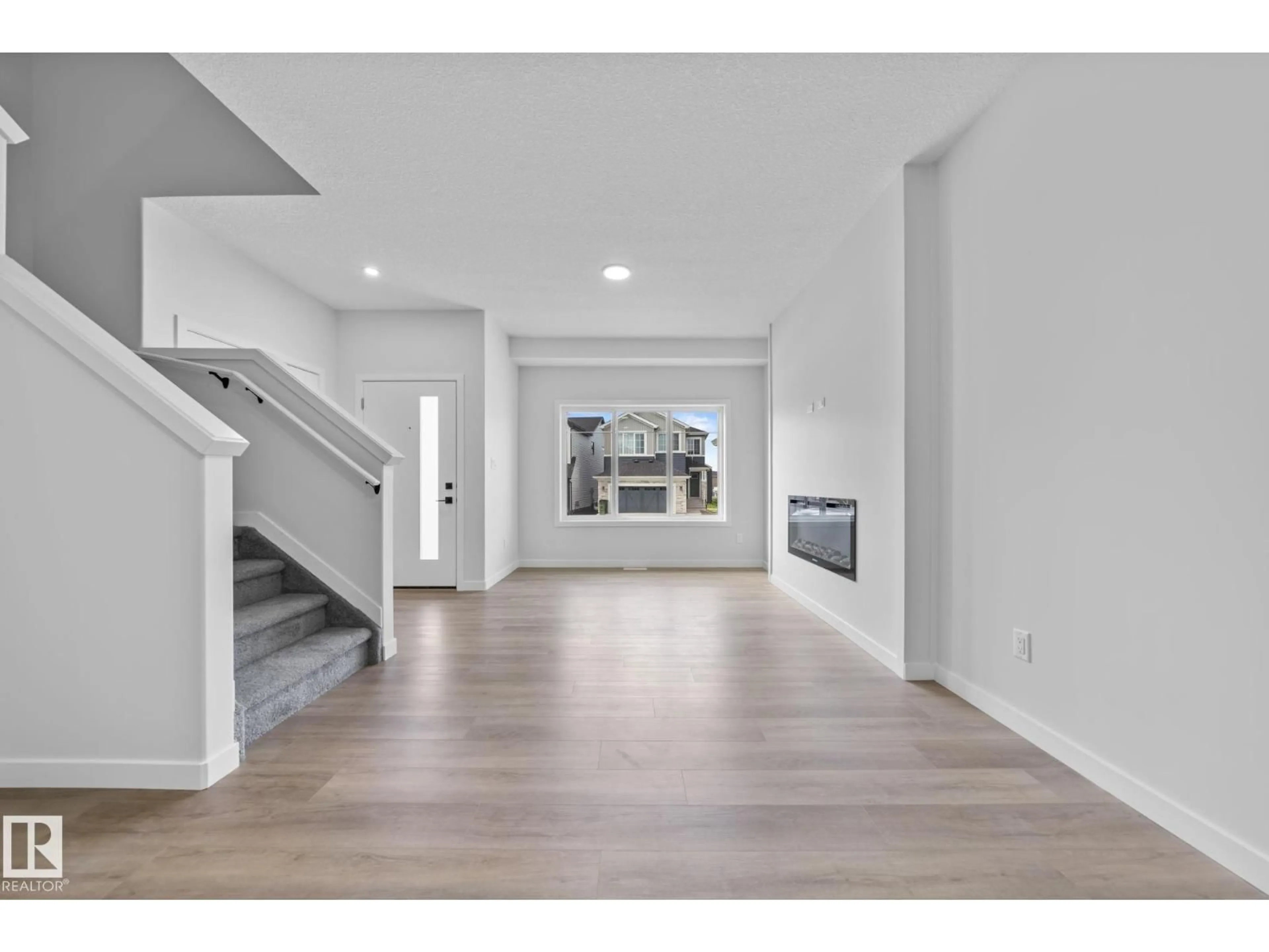 Indoor entryway for 16521 20 AV, Edmonton Alberta T6W5K1