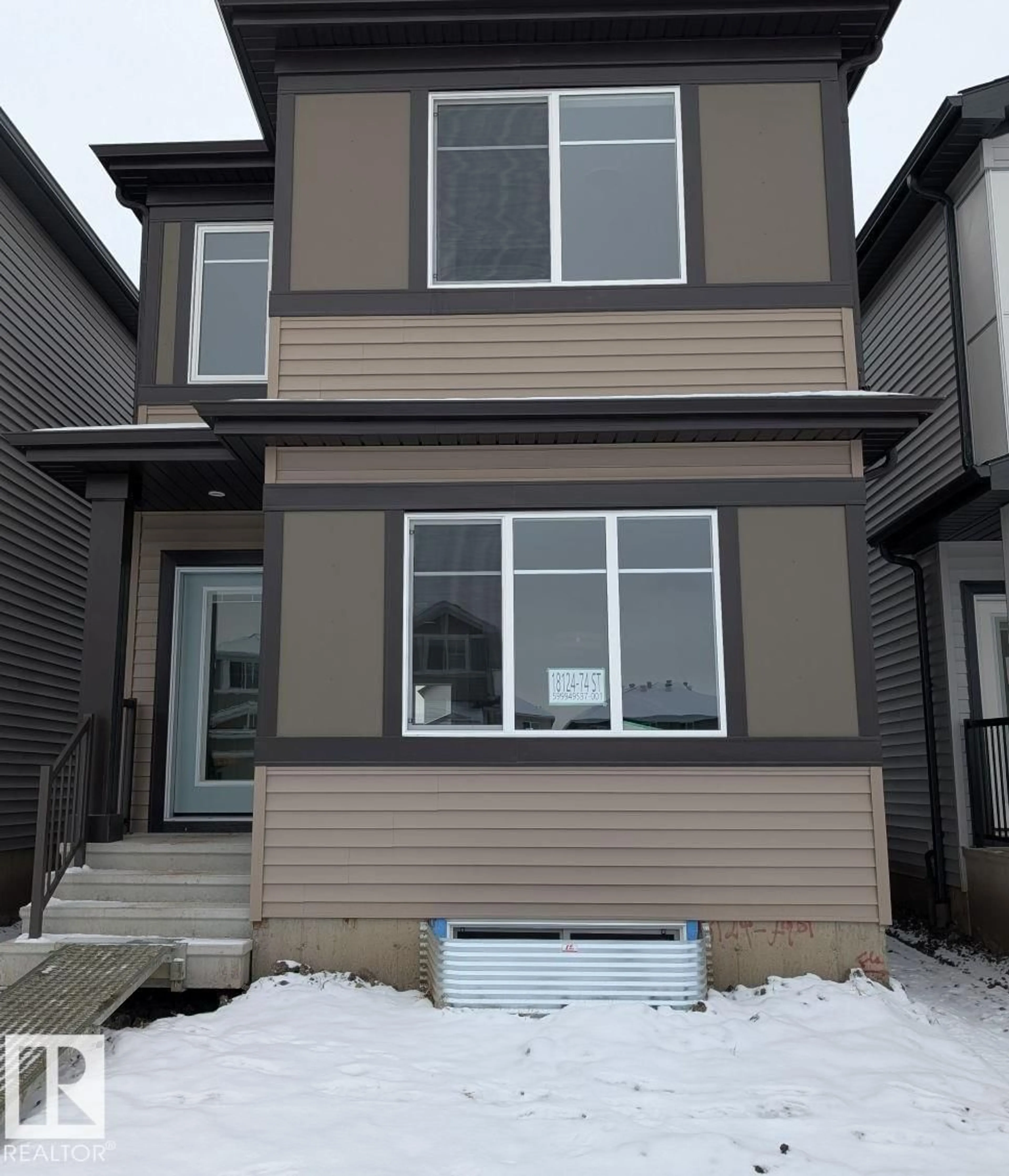 Home with vinyl exterior material, street for 18124 74 ST, Edmonton Alberta T5Z0J1