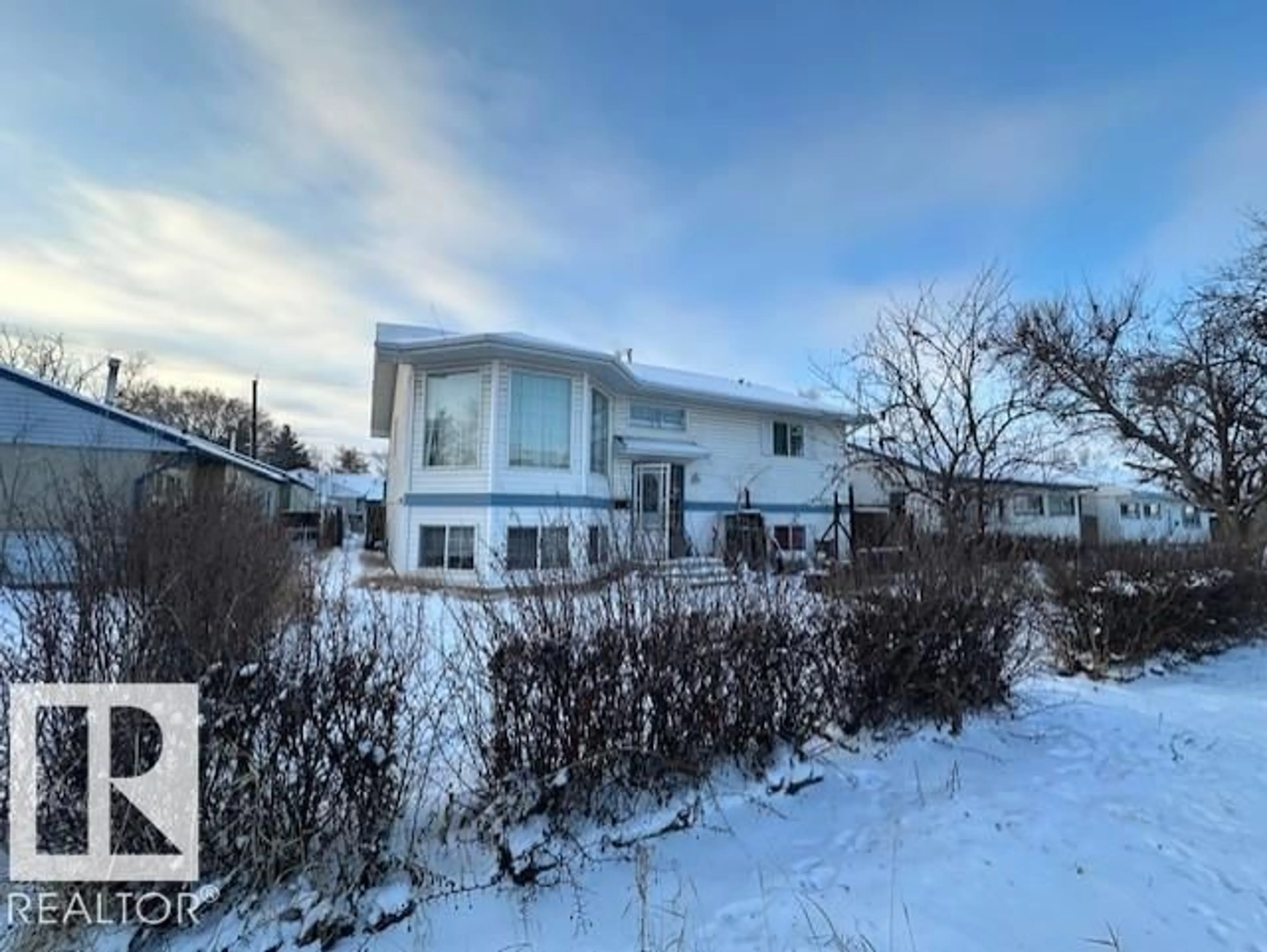 A pic from outside/outdoor area/front of a property/back of a property/a pic from drone, unknown for NW - 13132 132 ST, Edmonton Alberta T5R1R7