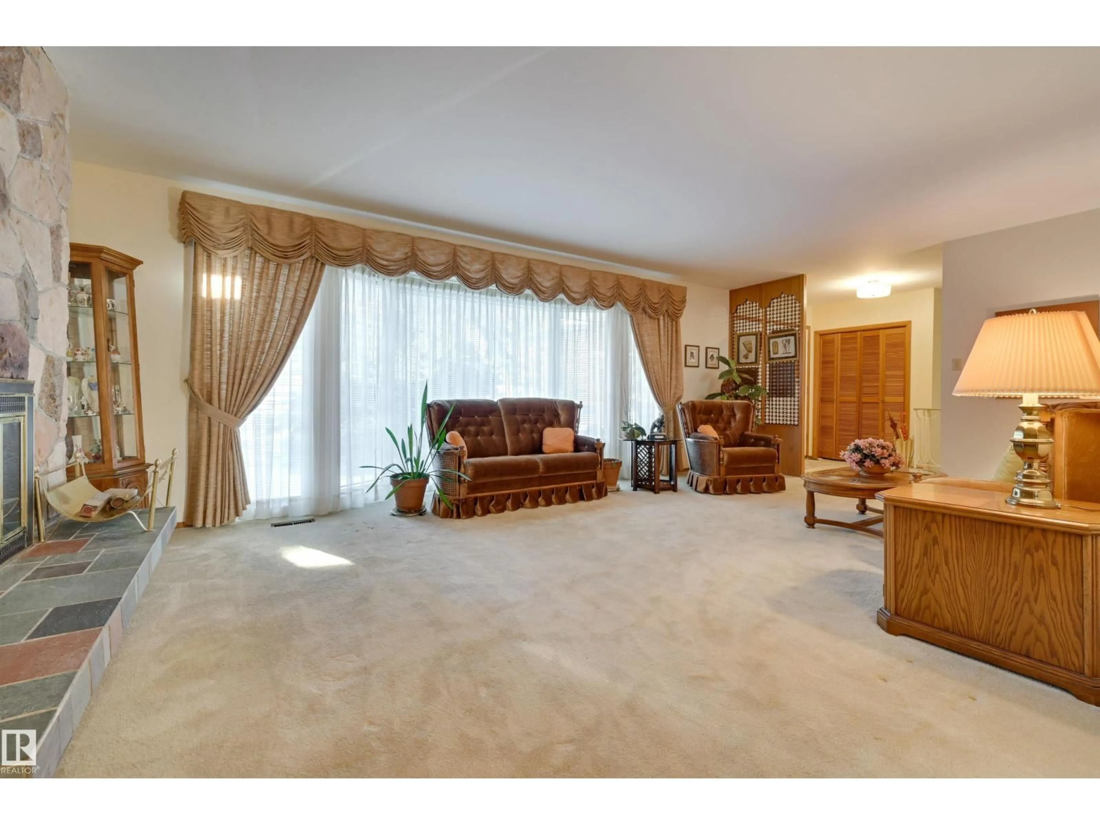 Living room with furniture, carpet floor for 13703 BUENA VISTA RD, Edmonton Alberta T5R5R5