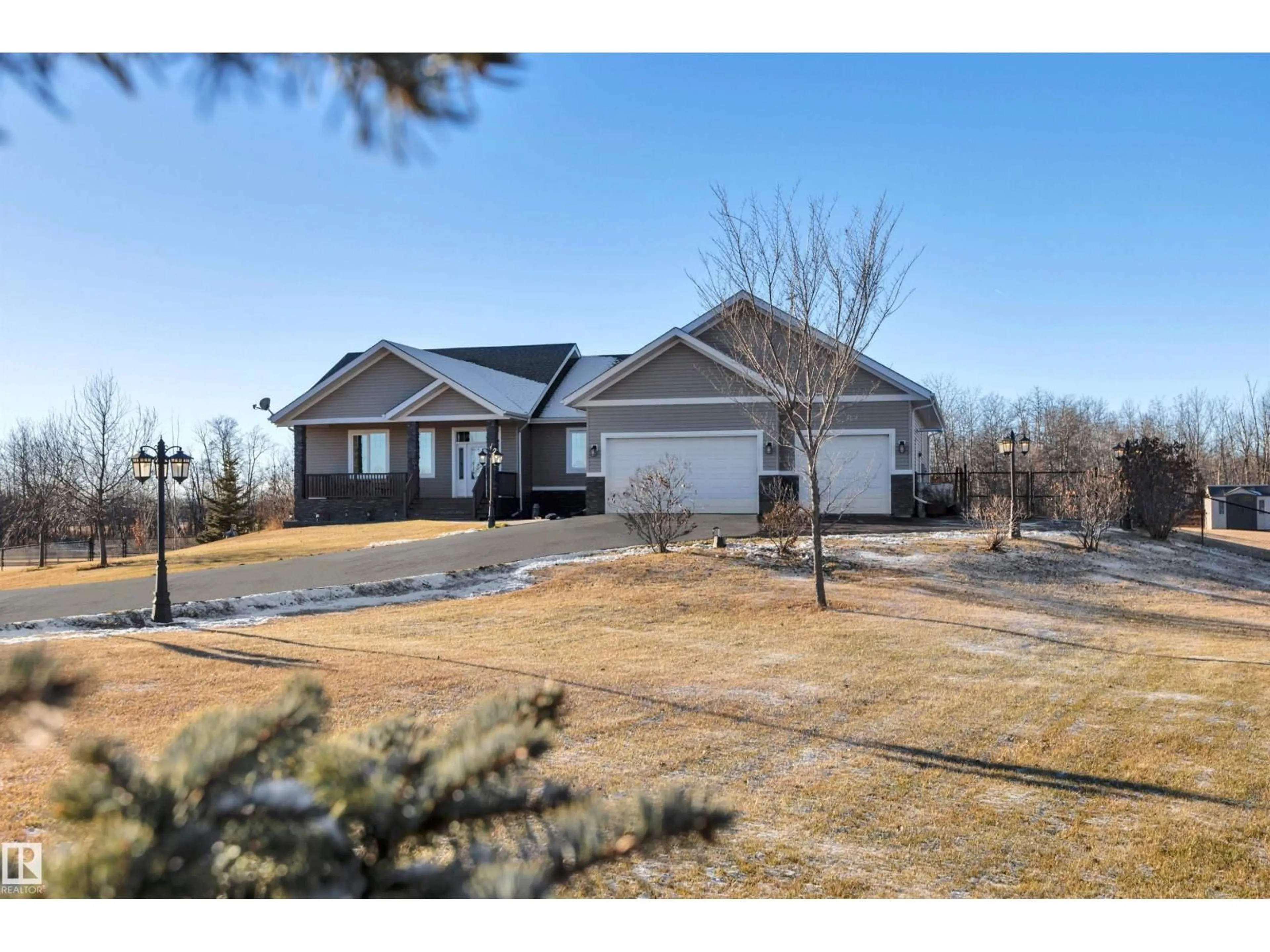 A pic from outside/outdoor area/front of a property/back of a property/a pic from drone, street for 540 50450 RGE RD 234, Rural Leduc County Alberta T4X0L7