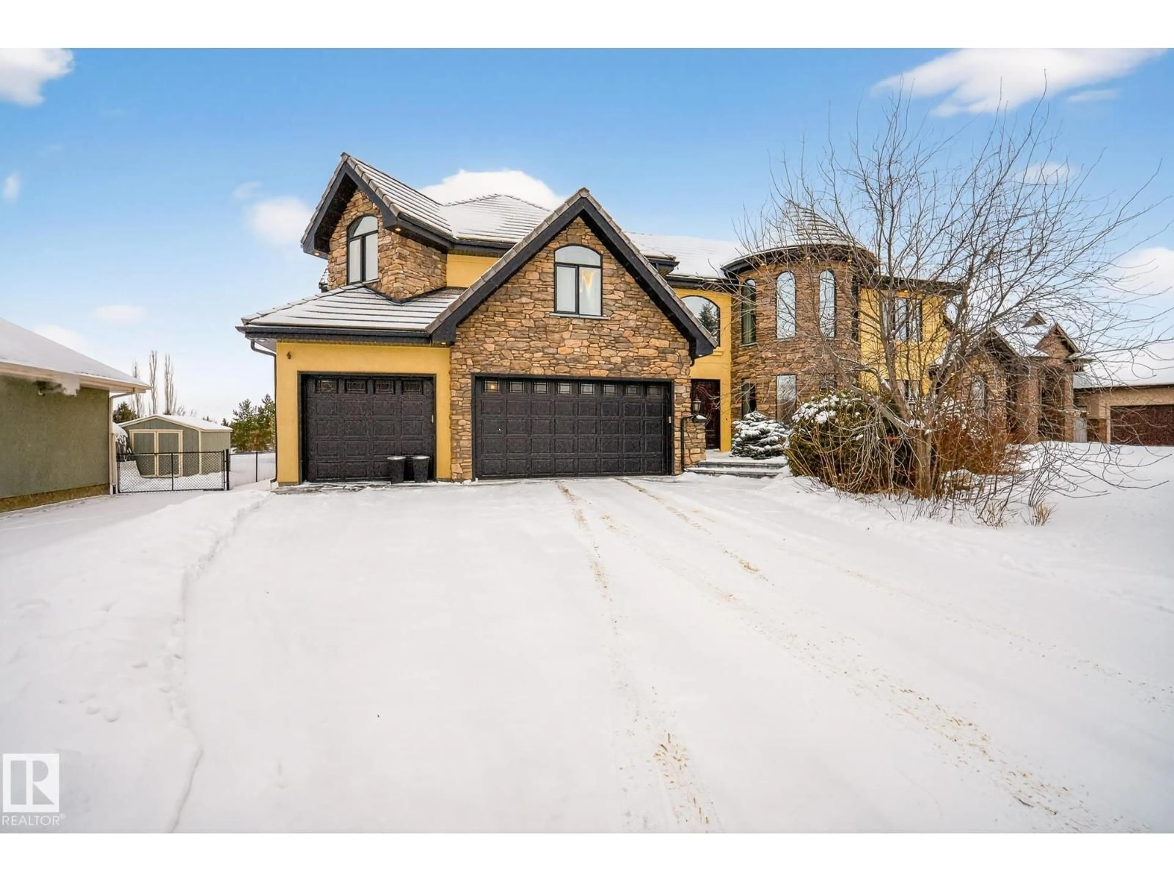 Home with brick exterior material, street for 115 - 54302 RGE ROAD 250, Rural Sturgeon County Alberta T8T0C9