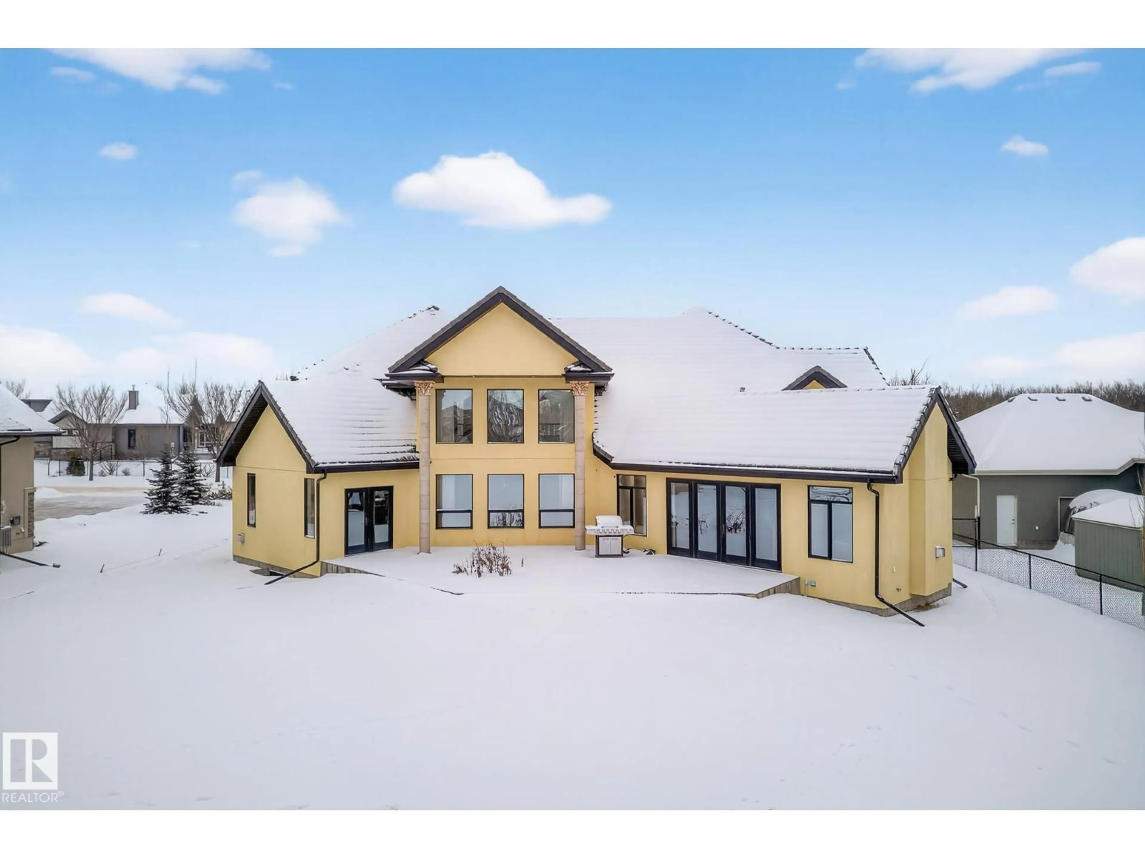 A pic from outside/outdoor area/front of a property/back of a property/a pic from drone, building for 115 - 54302 RGE ROAD 250, Rural Sturgeon County Alberta T8T0C9