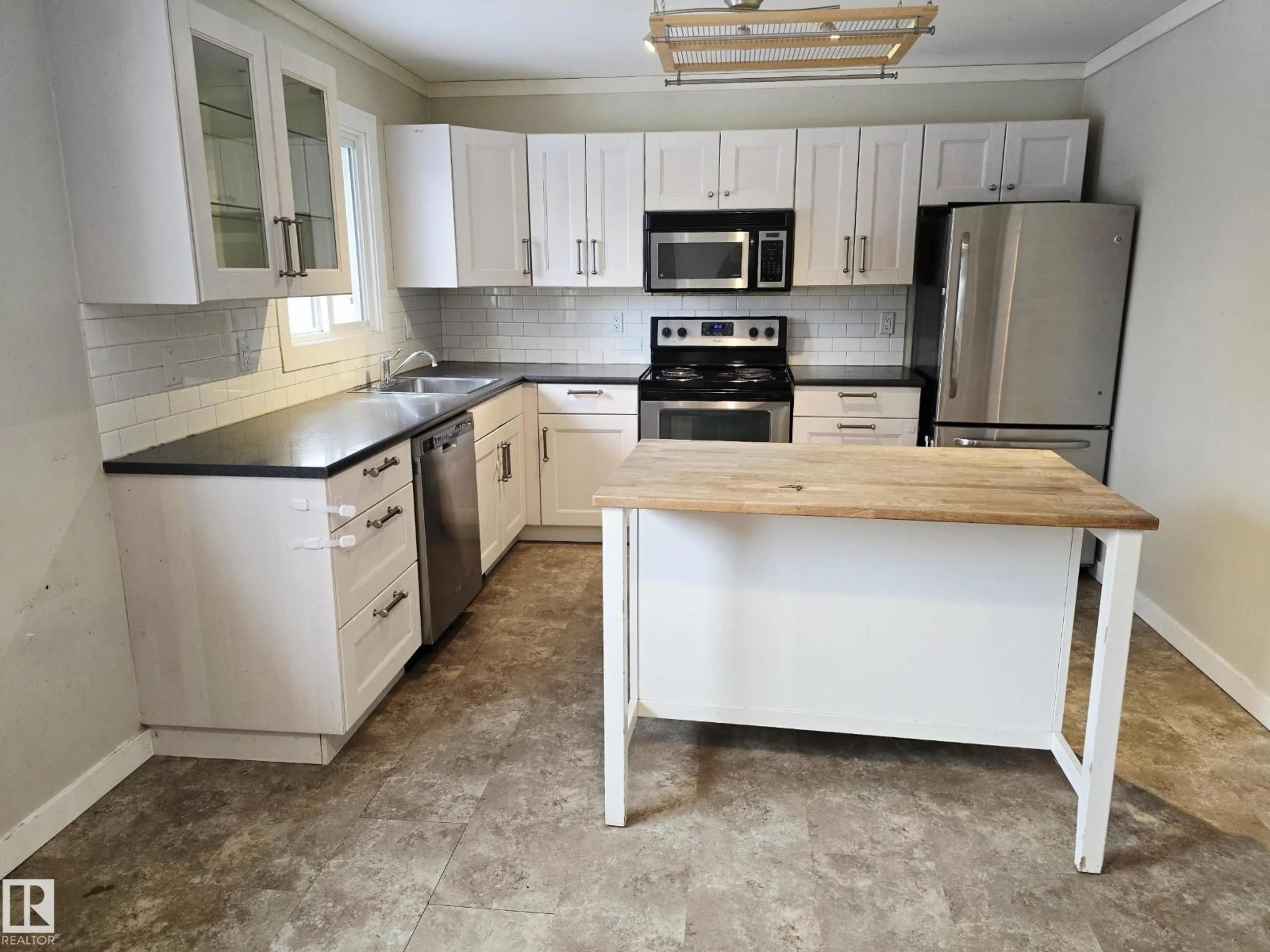 Open concept kitchen, unknown for 2509 89 ST, Edmonton Alberta T6K2Y8