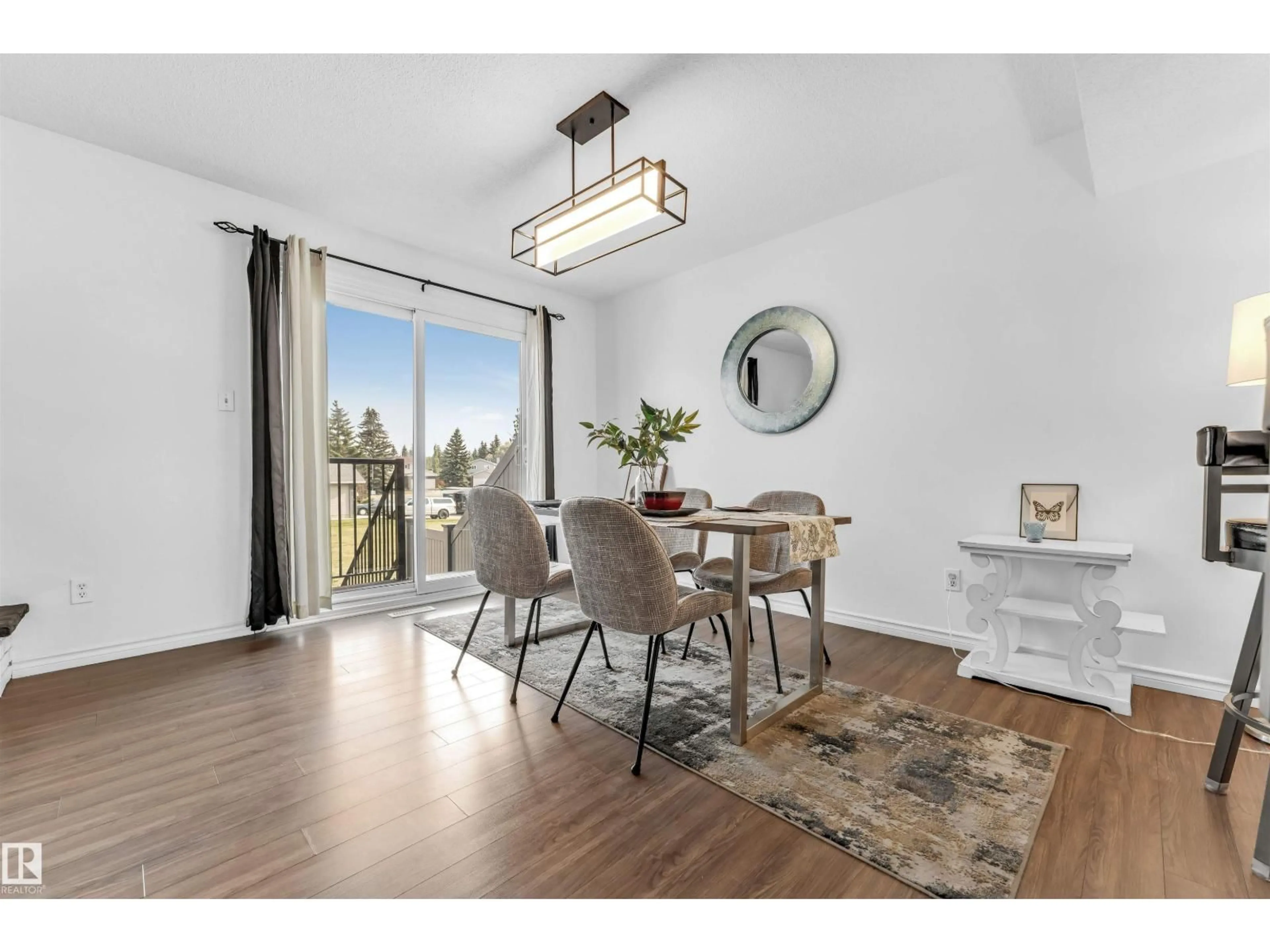 Dining room, wood/laminate floor for 5344 38A AV, Edmonton Alberta T6L2H4